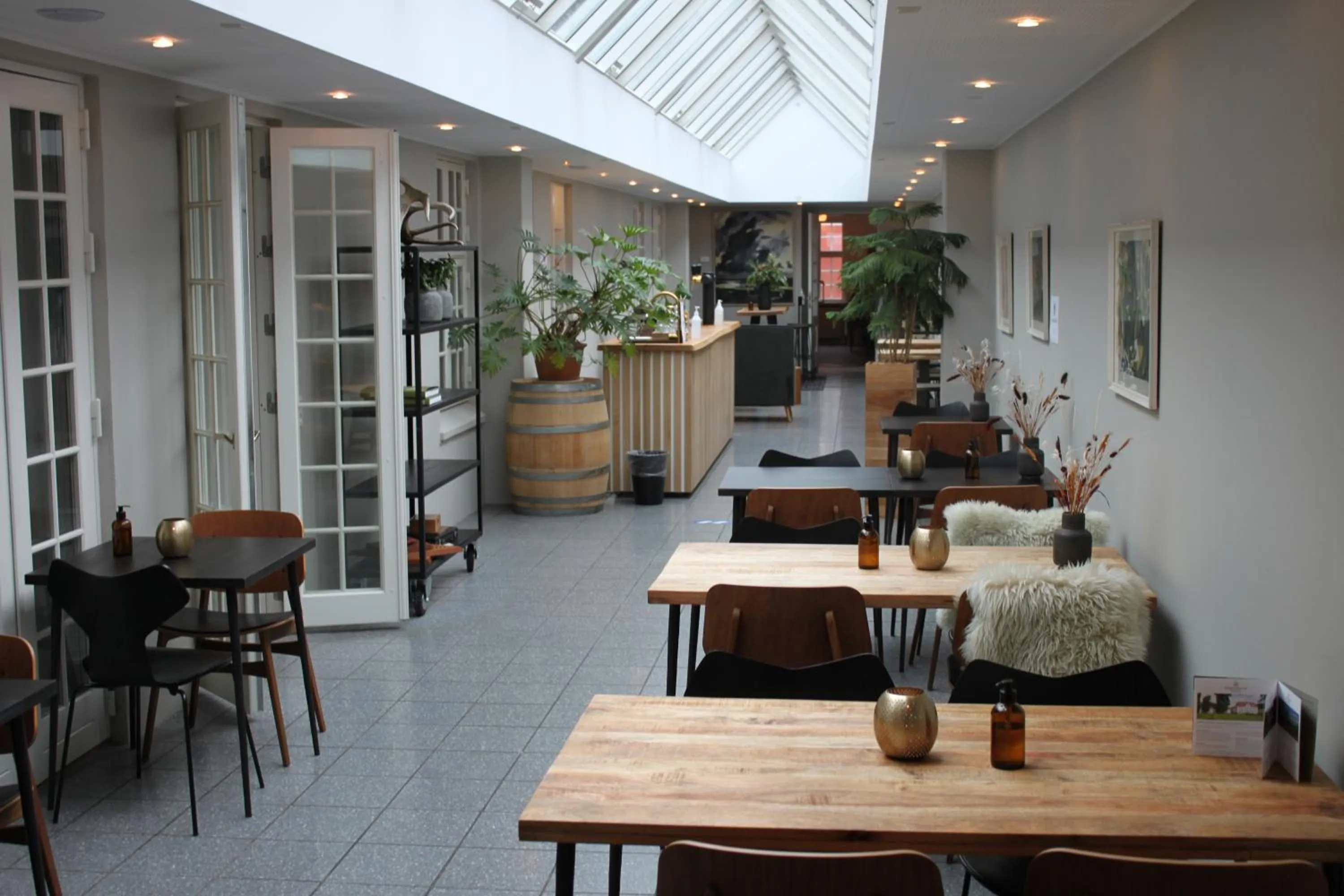 Communal lounge/ TV room in Skarrildhus Sinatur Hotel & Konference