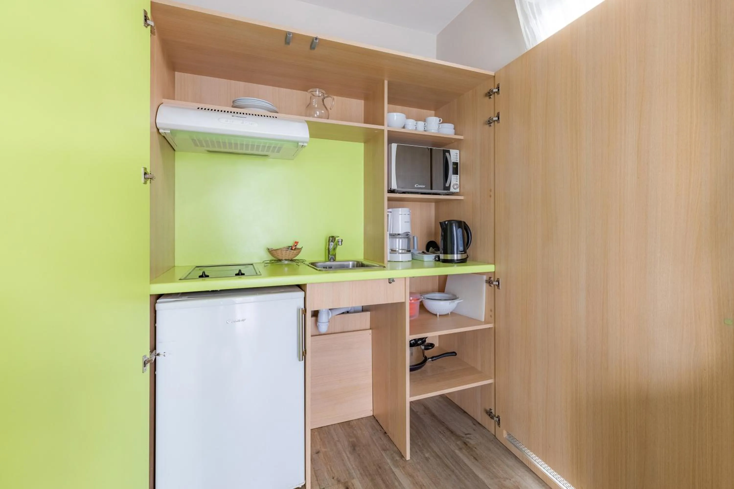 Kitchen or kitchenette in Appart’City Confort Tours