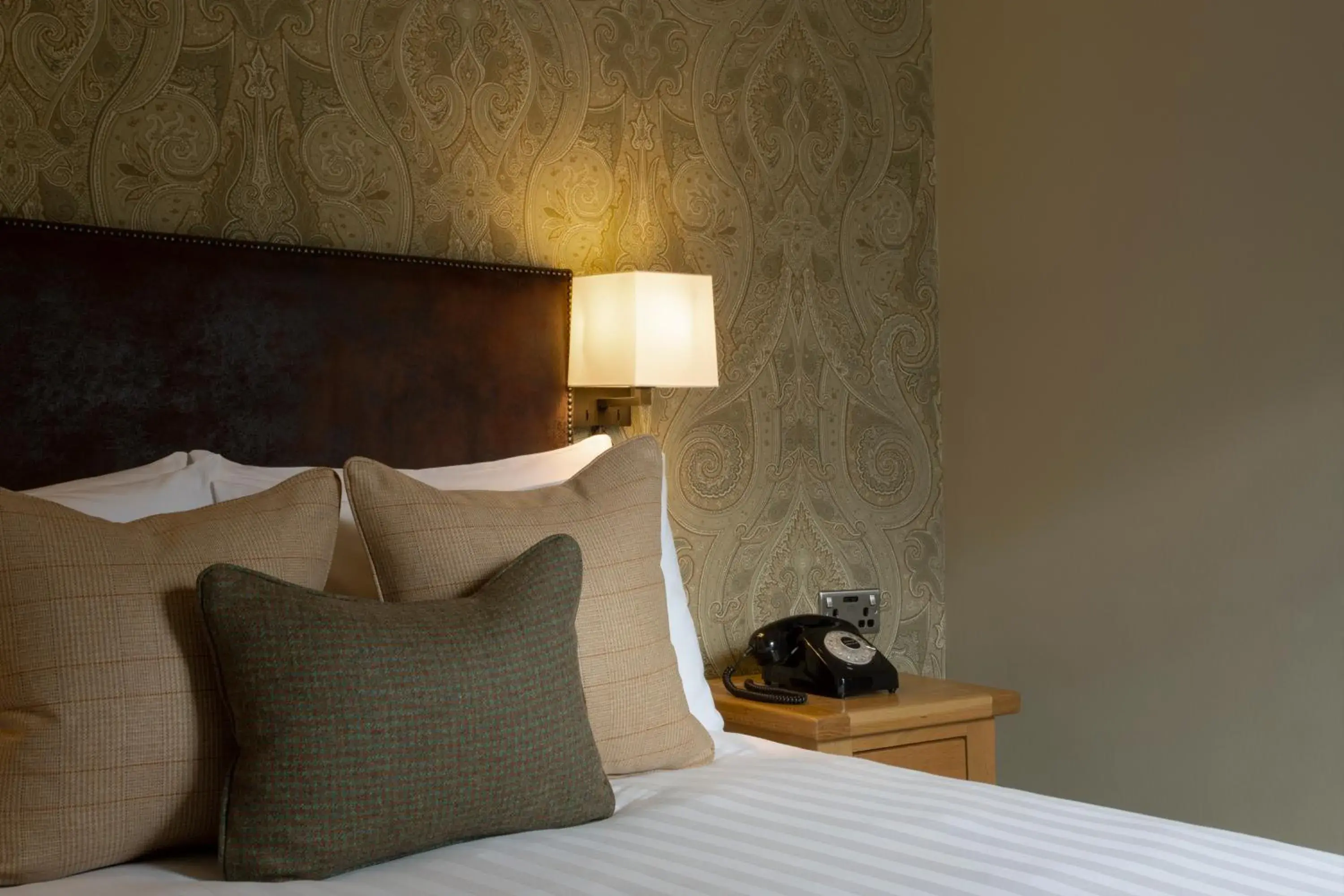 Bed in The Glencoe Inn Bed in The Glencoe Inn