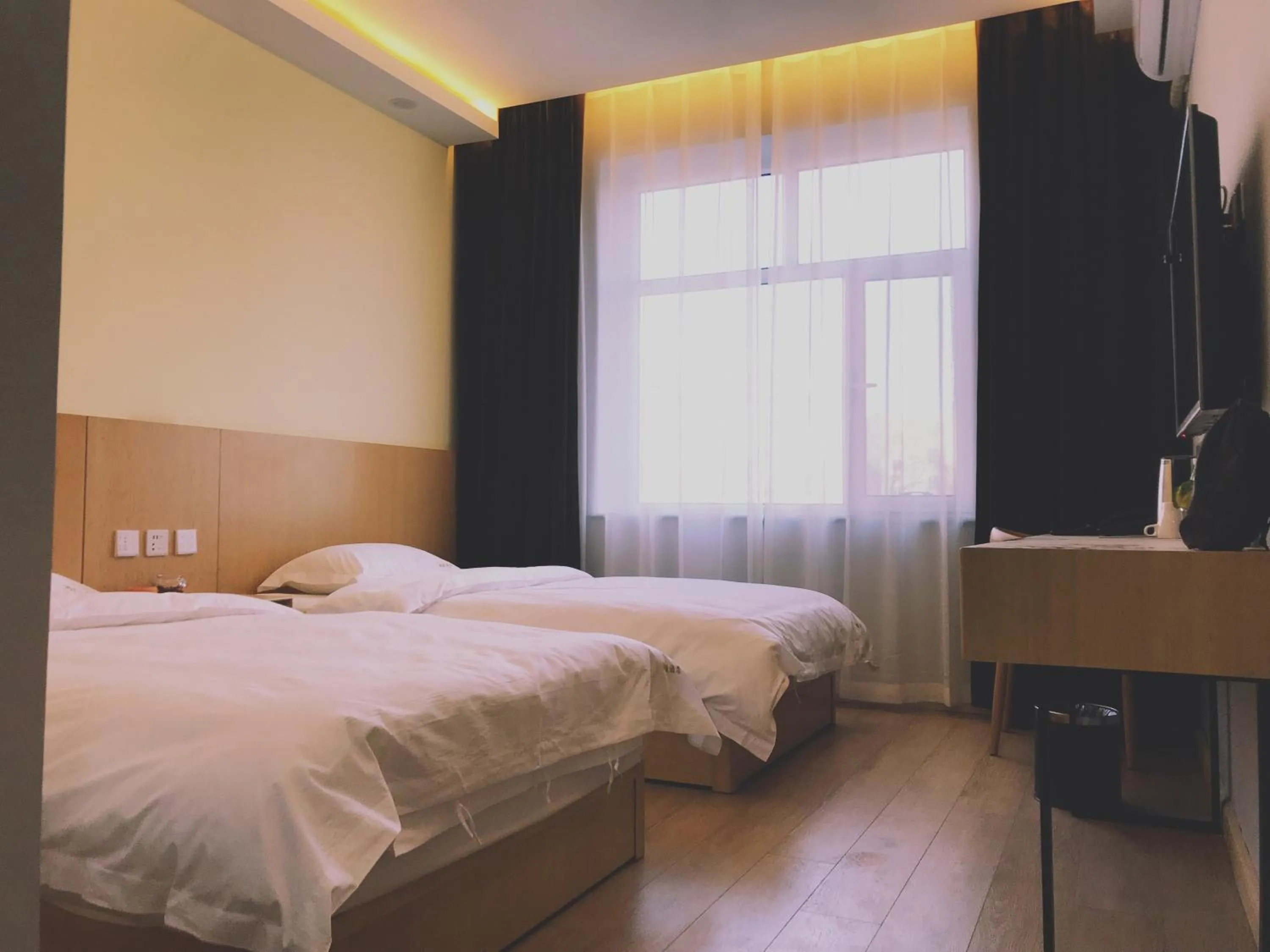 Bed in Lantern Hotel