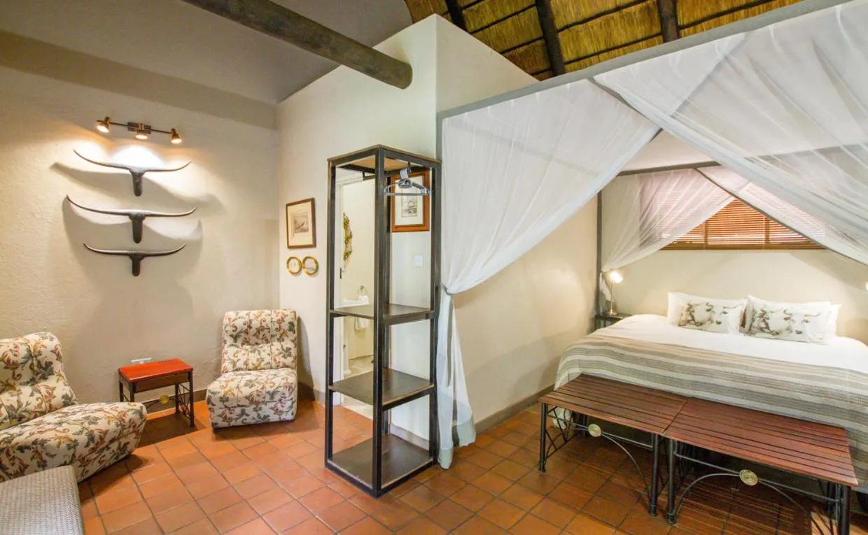 Photo of the whole room, Bed in Nguni Lodge