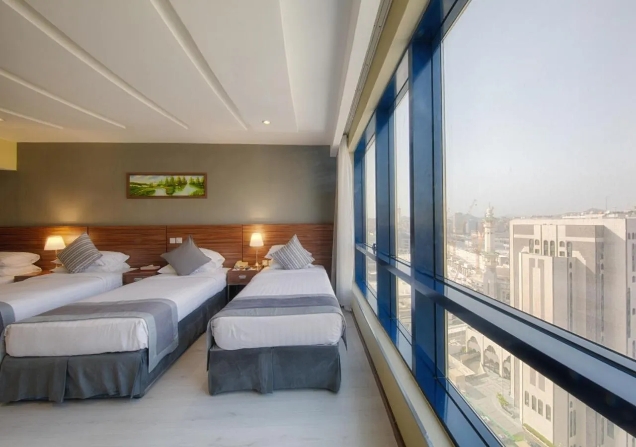 Bed in Al Safwah Orchid Hotel