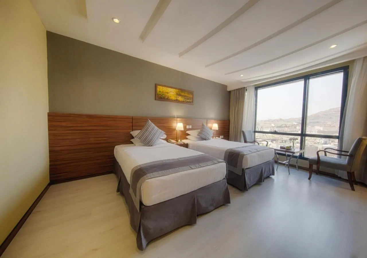 Bed in Al Safwah Orchid Hotel