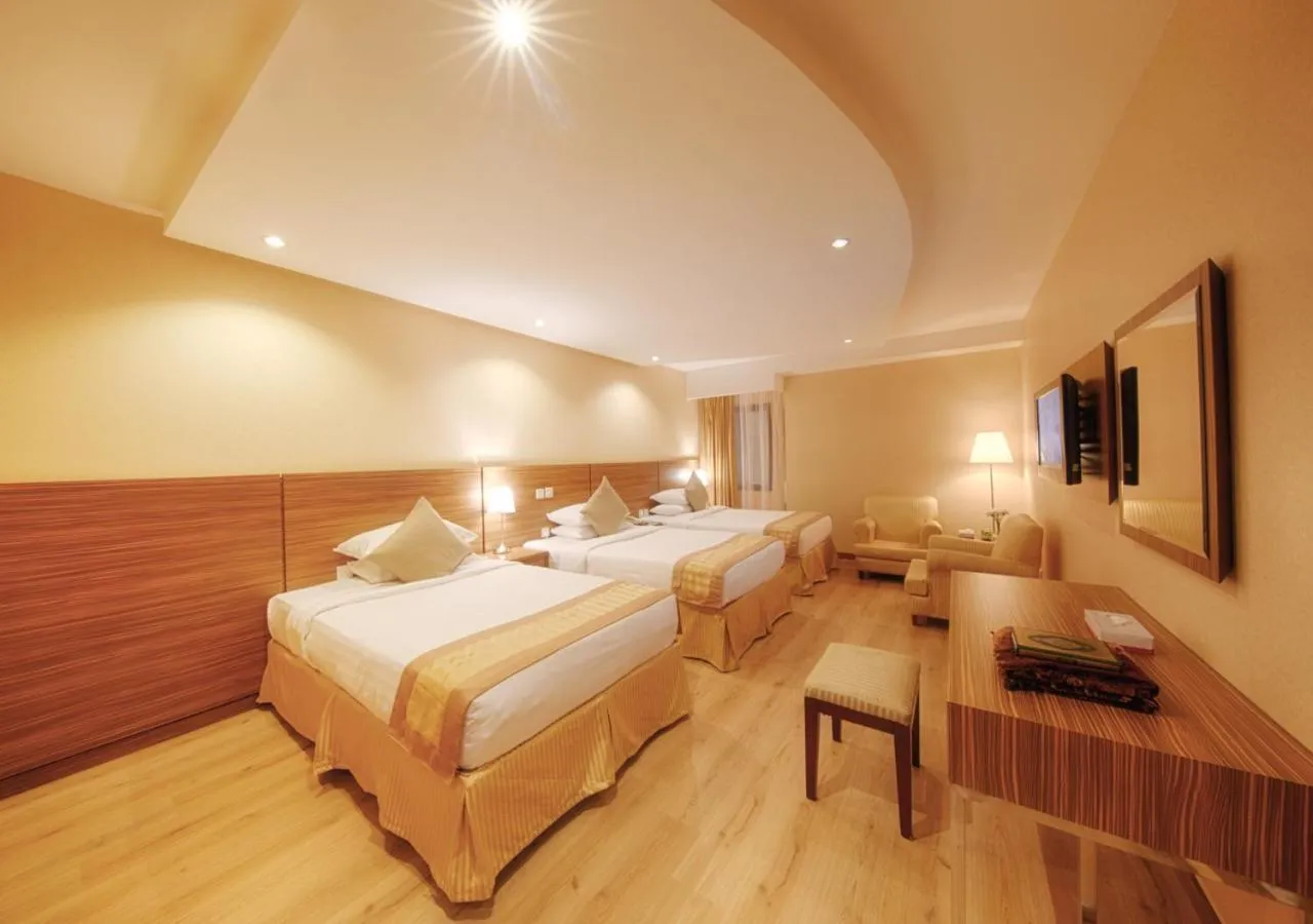 Bed in Al Safwah Orchid Hotel