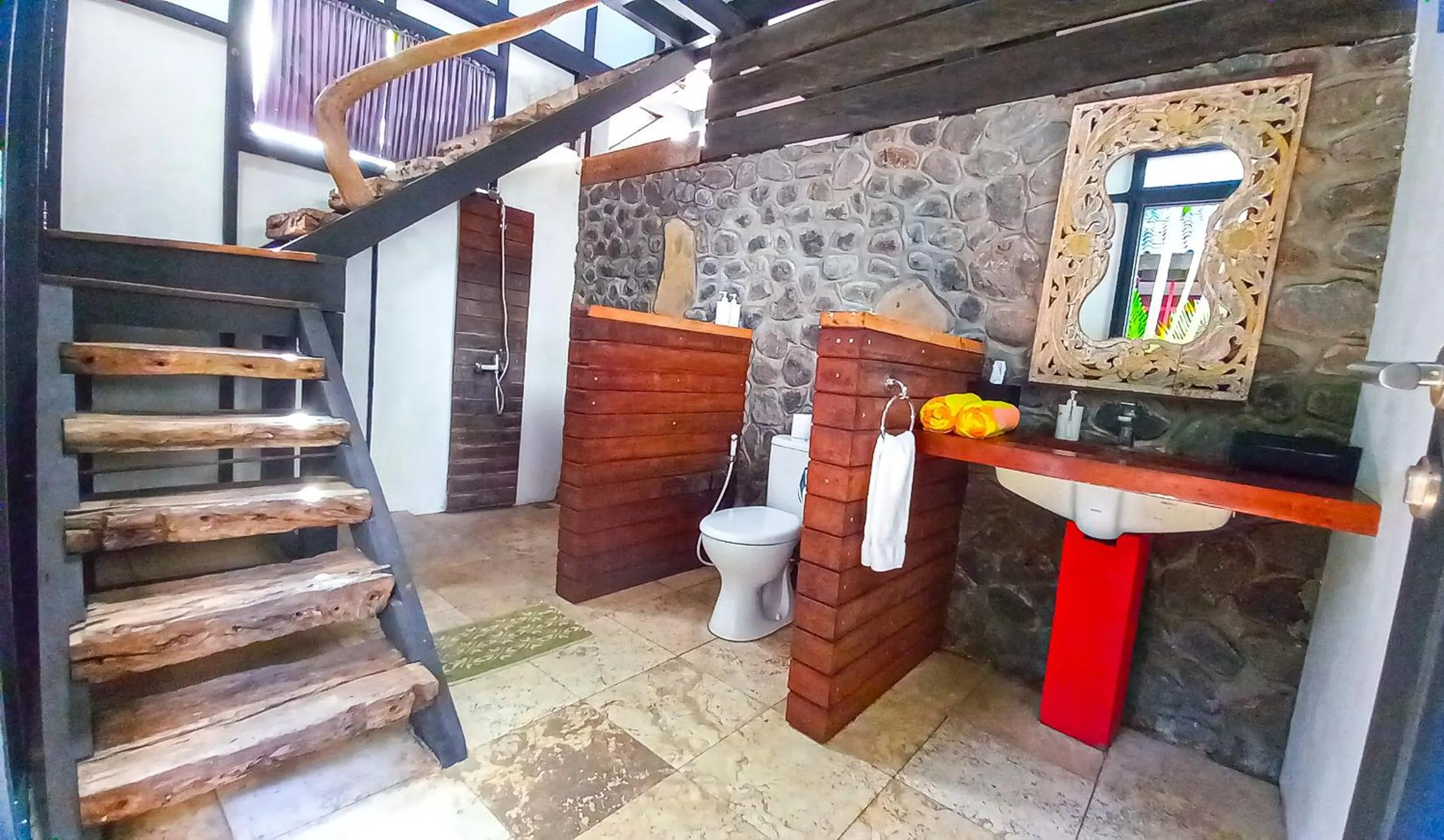 Bathroom in Amed Lodge by Sudamala Resorts