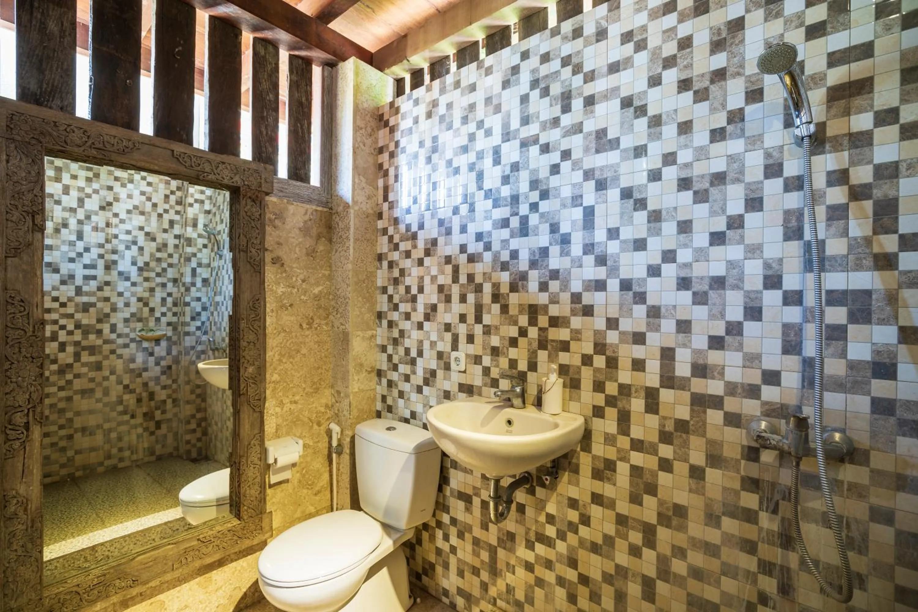 Bathroom in Amed Lodge by Sudamala Resorts