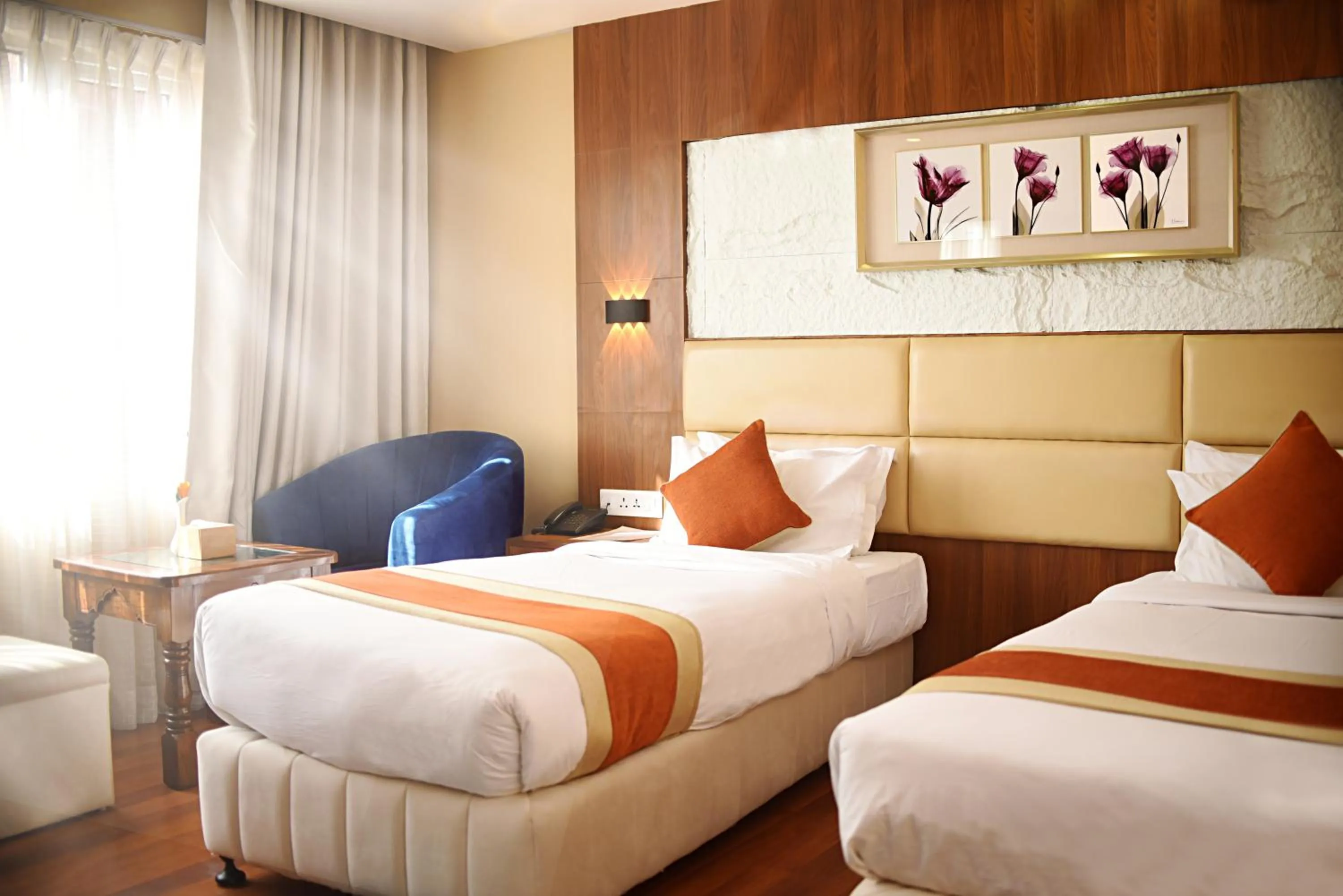 Bed in Kumari Boutique Hotel