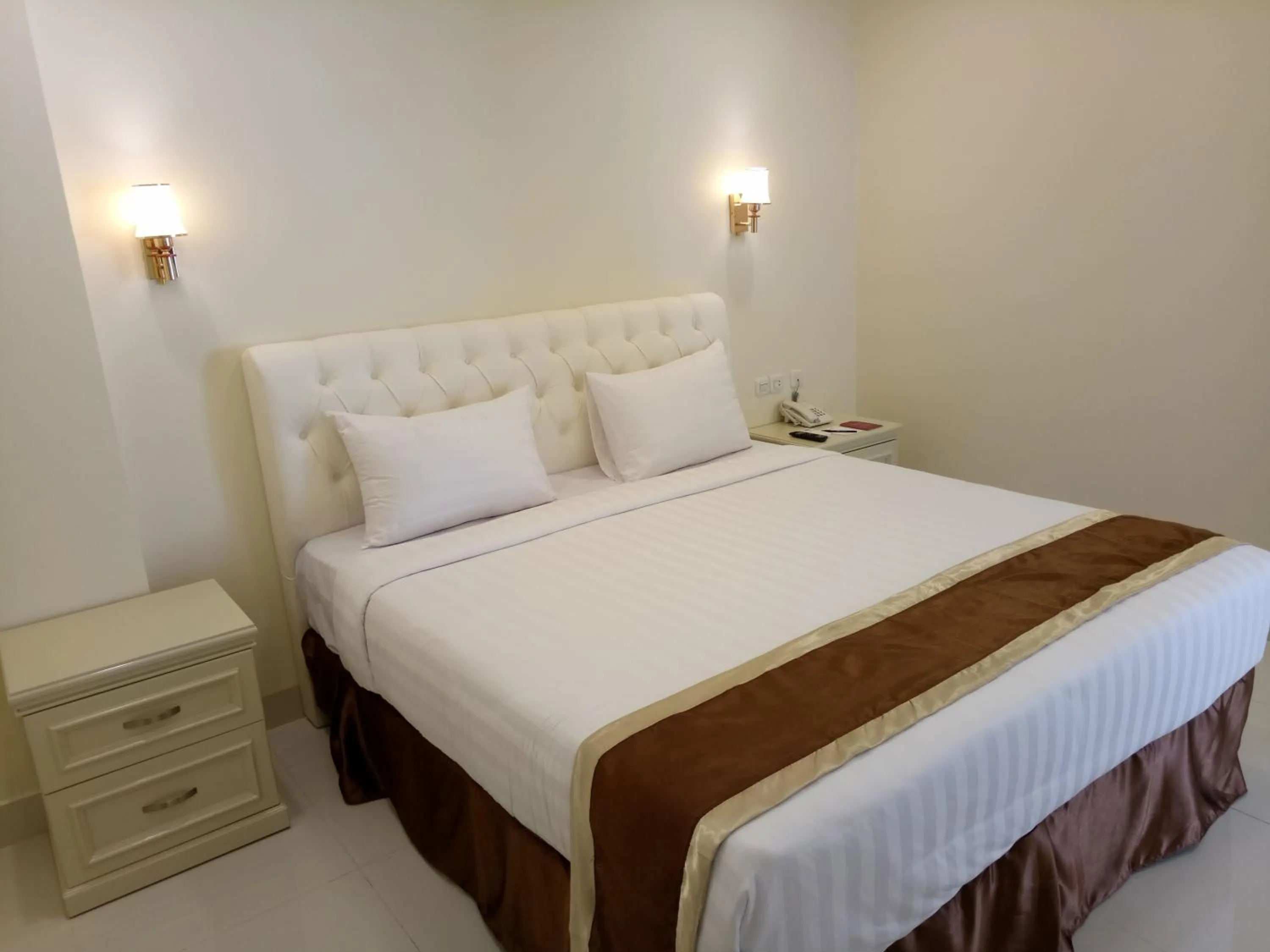 Bed in Grand Town Hotel Mandai