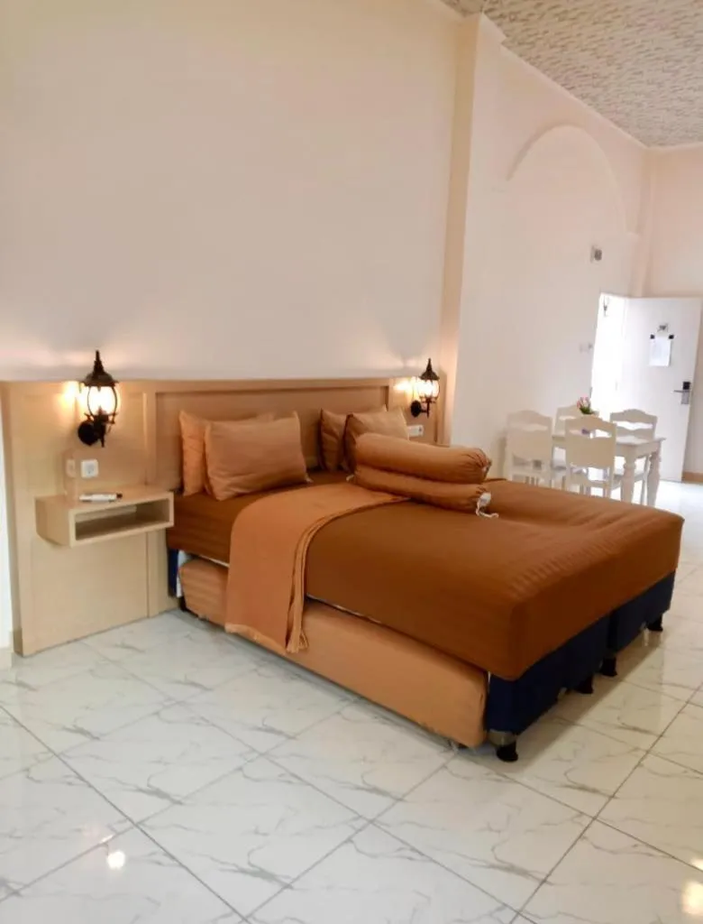 Bed in Grand Town Hotel Mandai