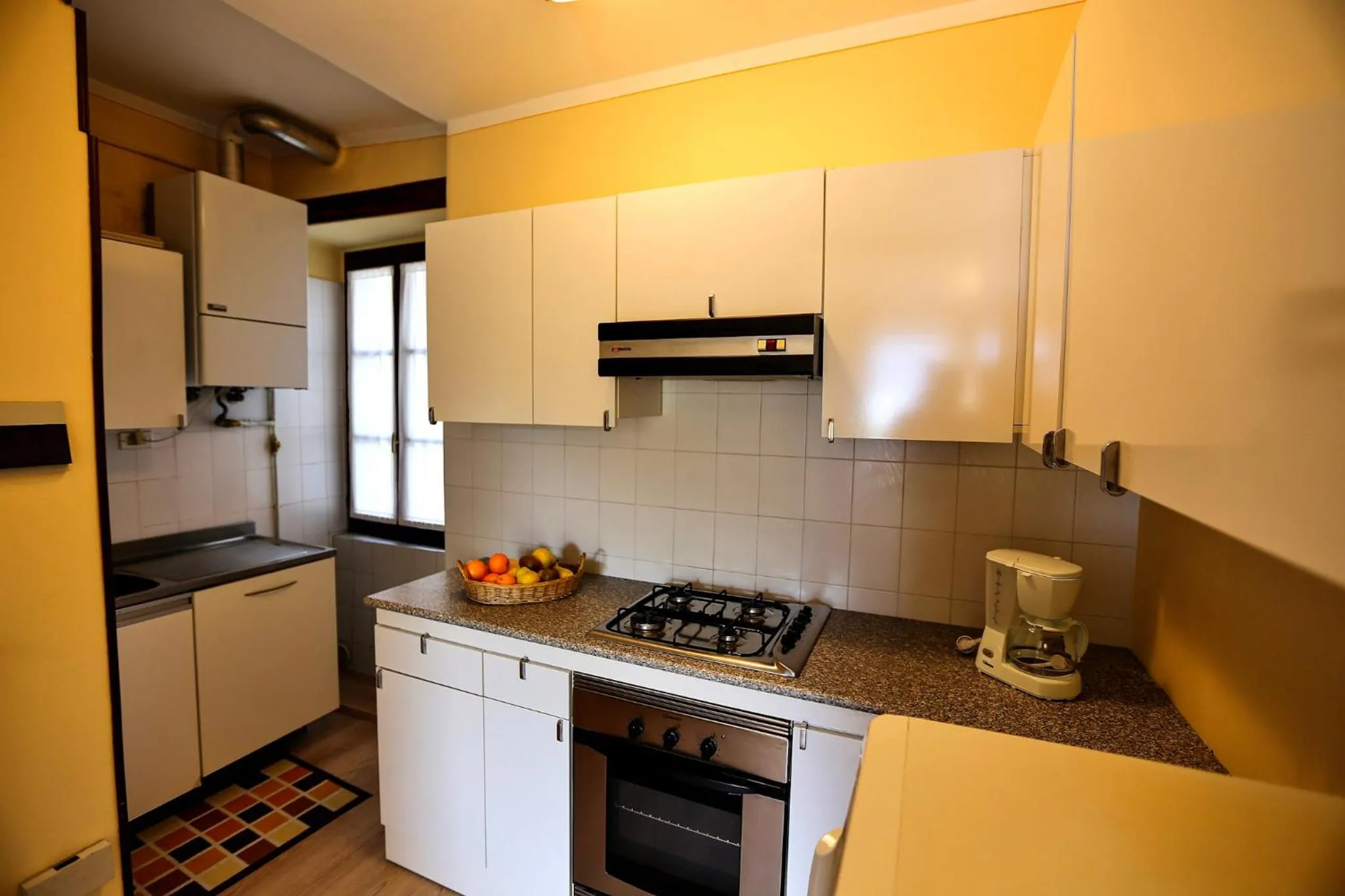 Kitchen or kitchenette in Appartamento Castello