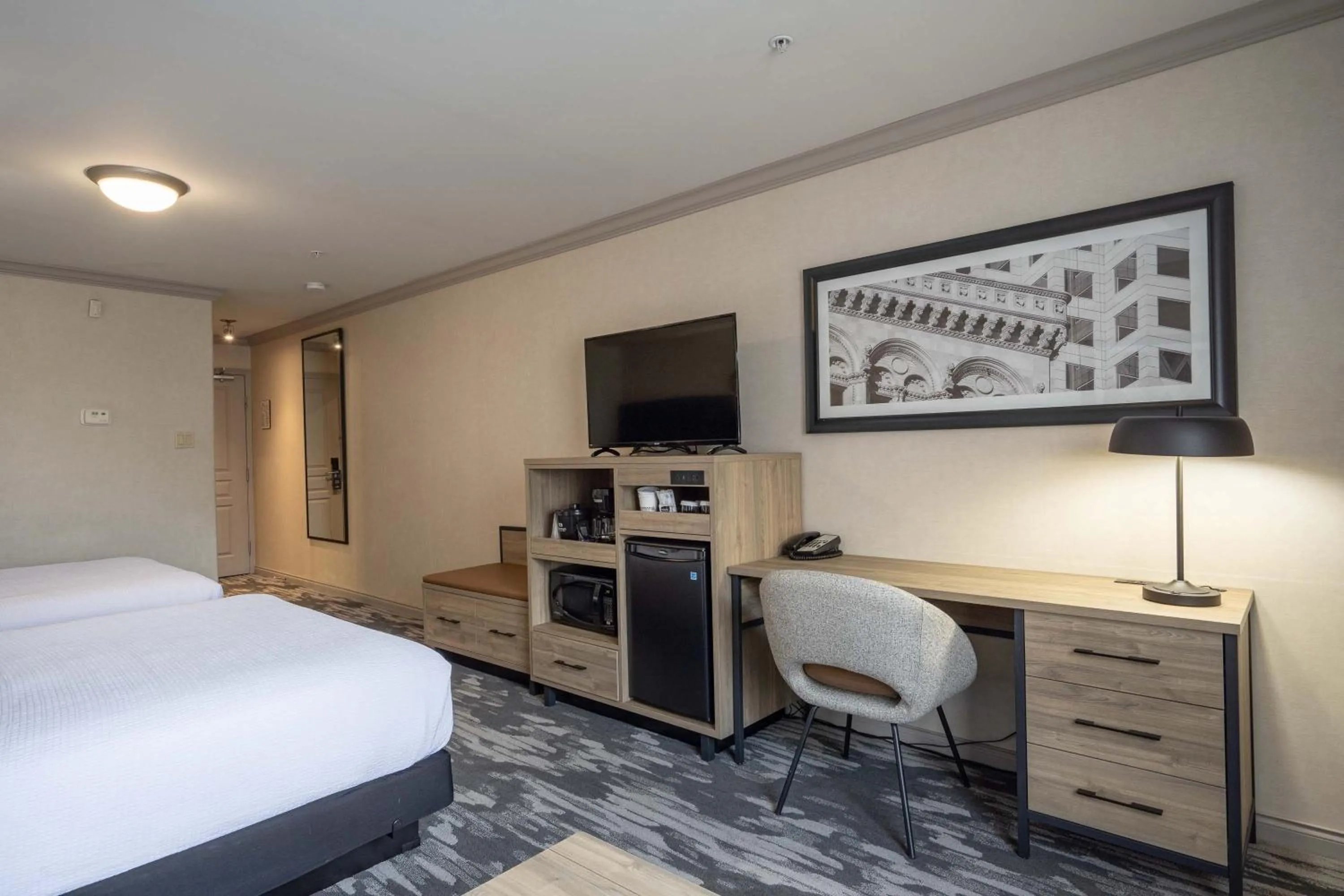 Photo of the whole room, Bed in Sandman Hotel & Suites Winnipeg Airport