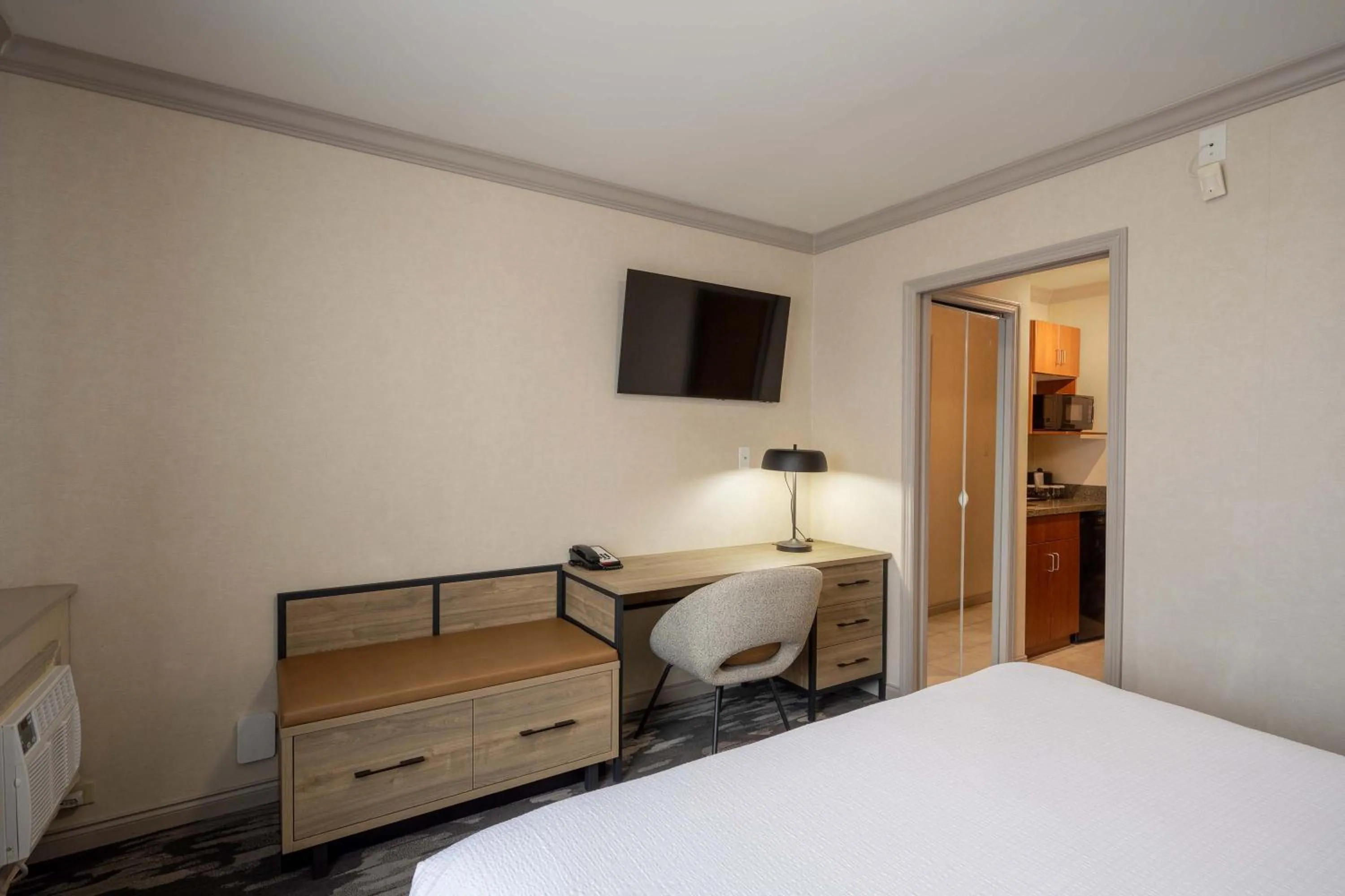 Photo of the whole room, Bed in Sandman Hotel & Suites Winnipeg Airport