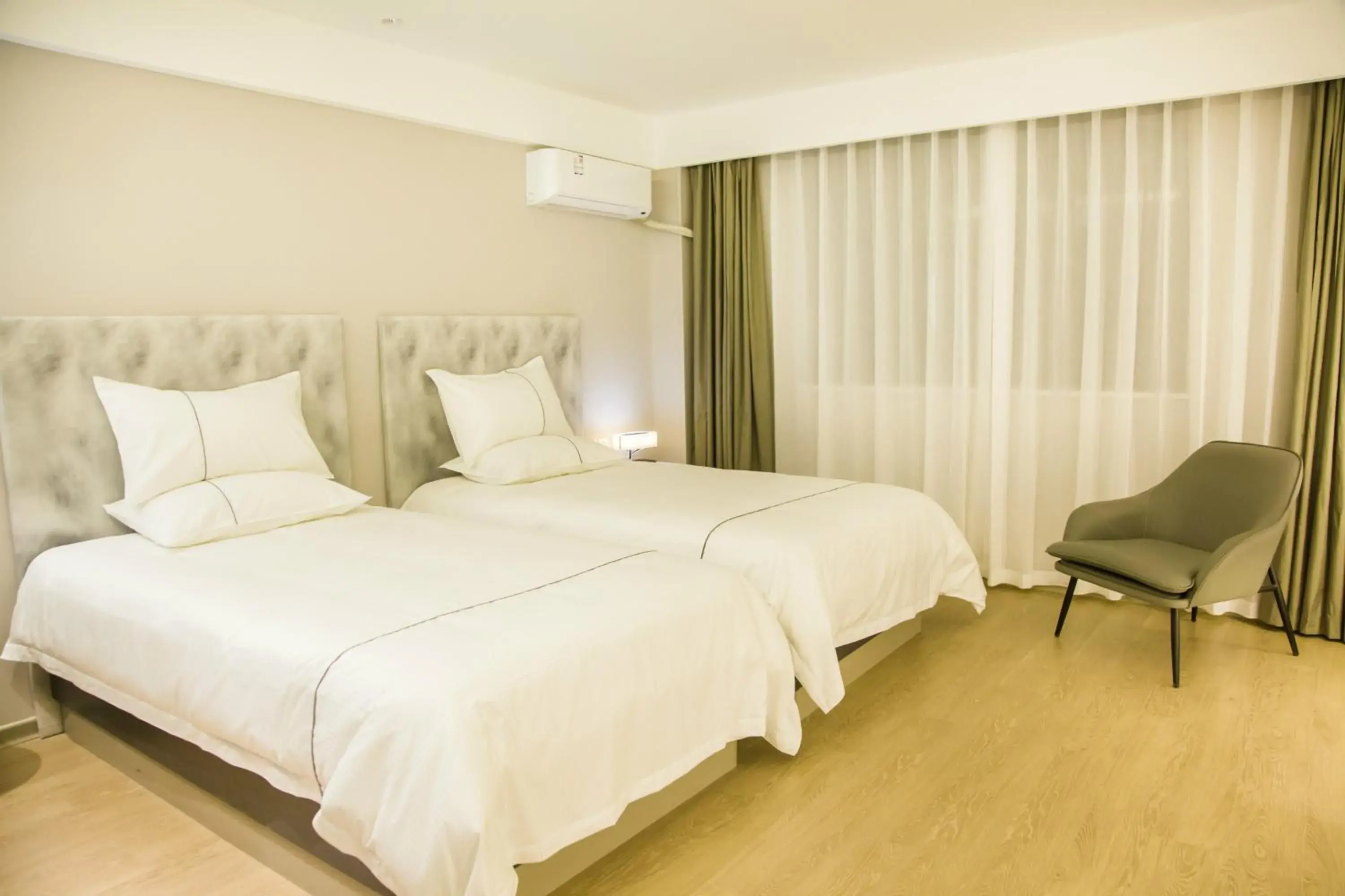 Bed in Magnotel Yangshuo West Street Bed in Magnotel Yangshuo West Street