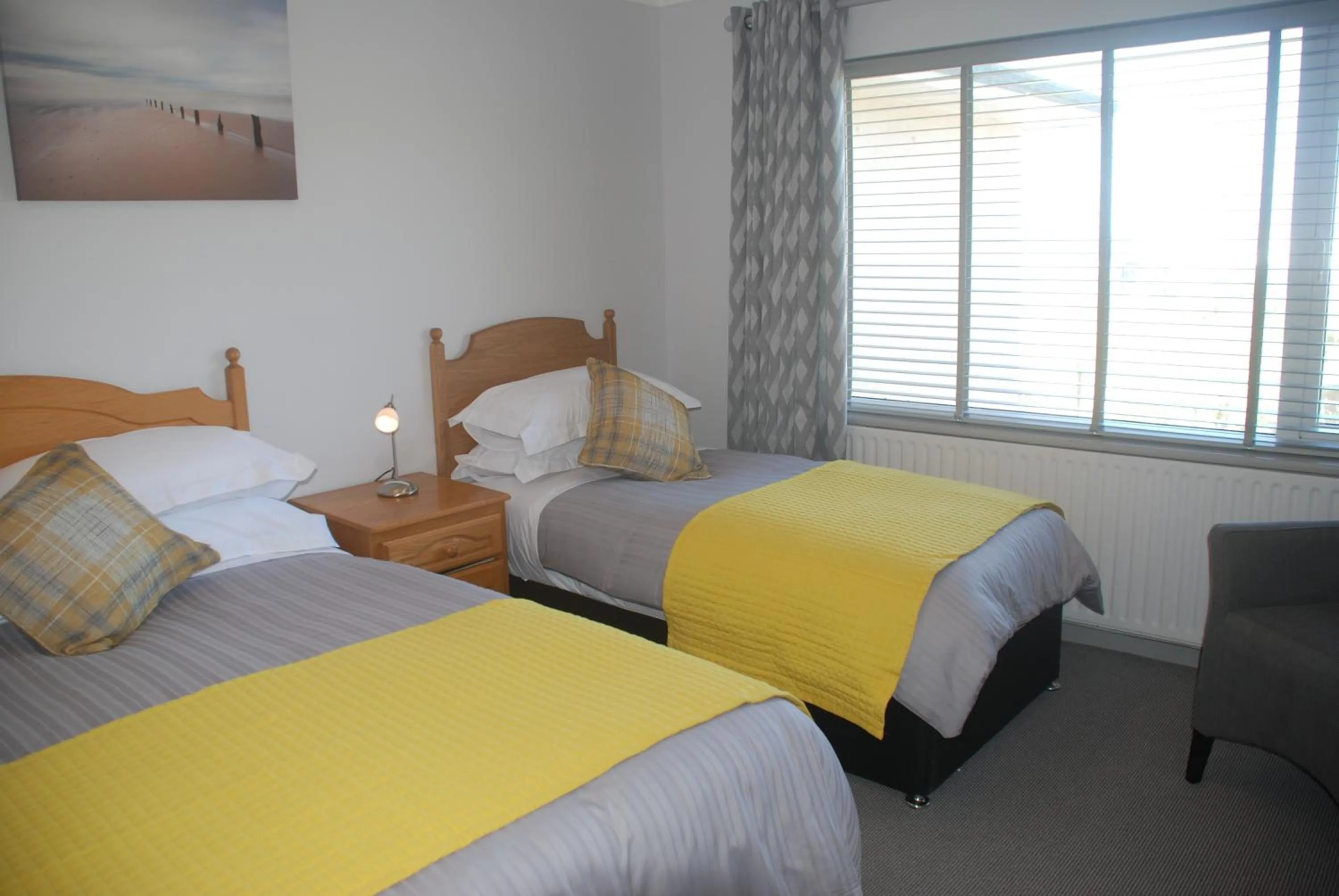 Bed in Tuskar House by the Sea