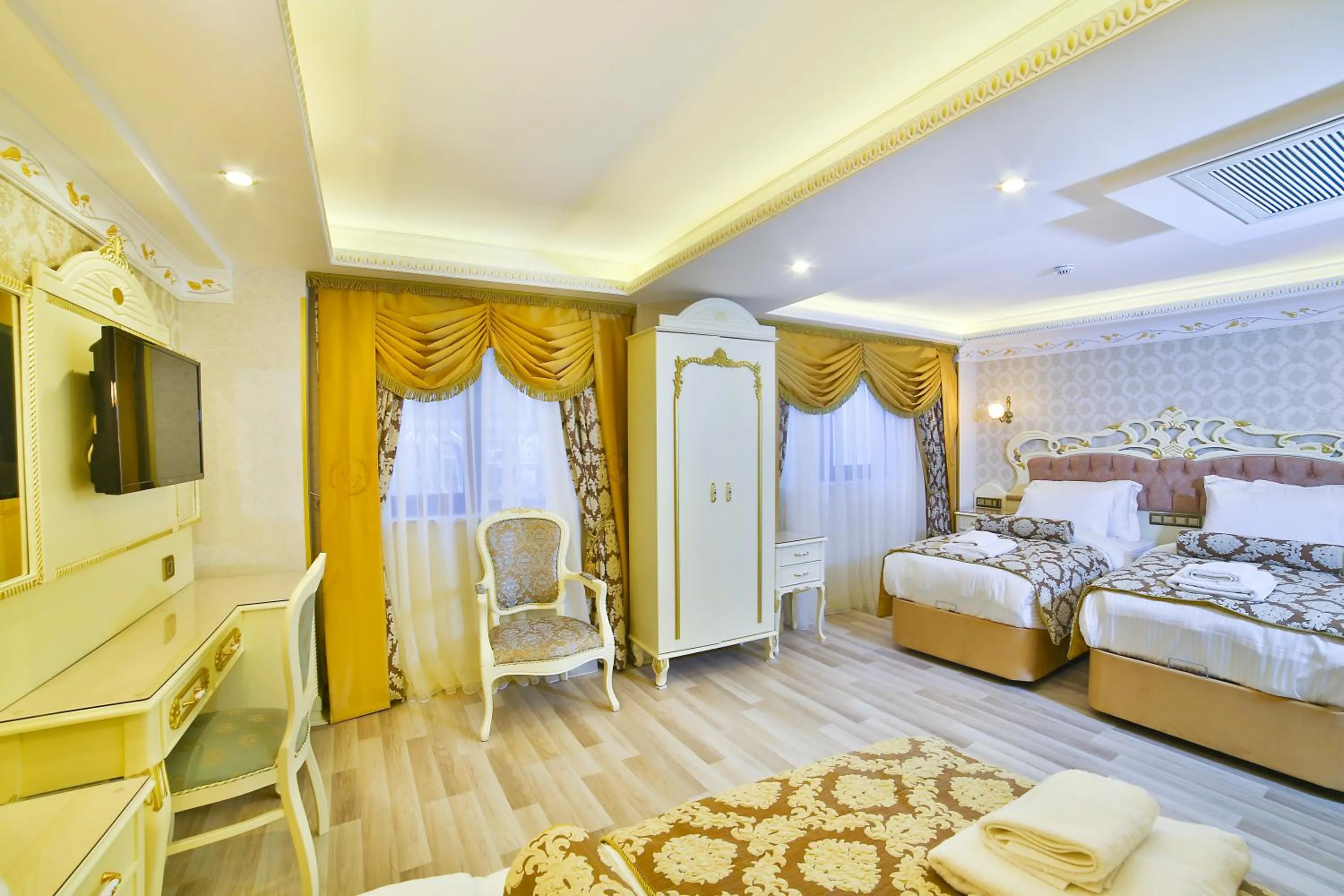 Photo of the whole room, Bed in Nayla Palace Hotel-Special Category