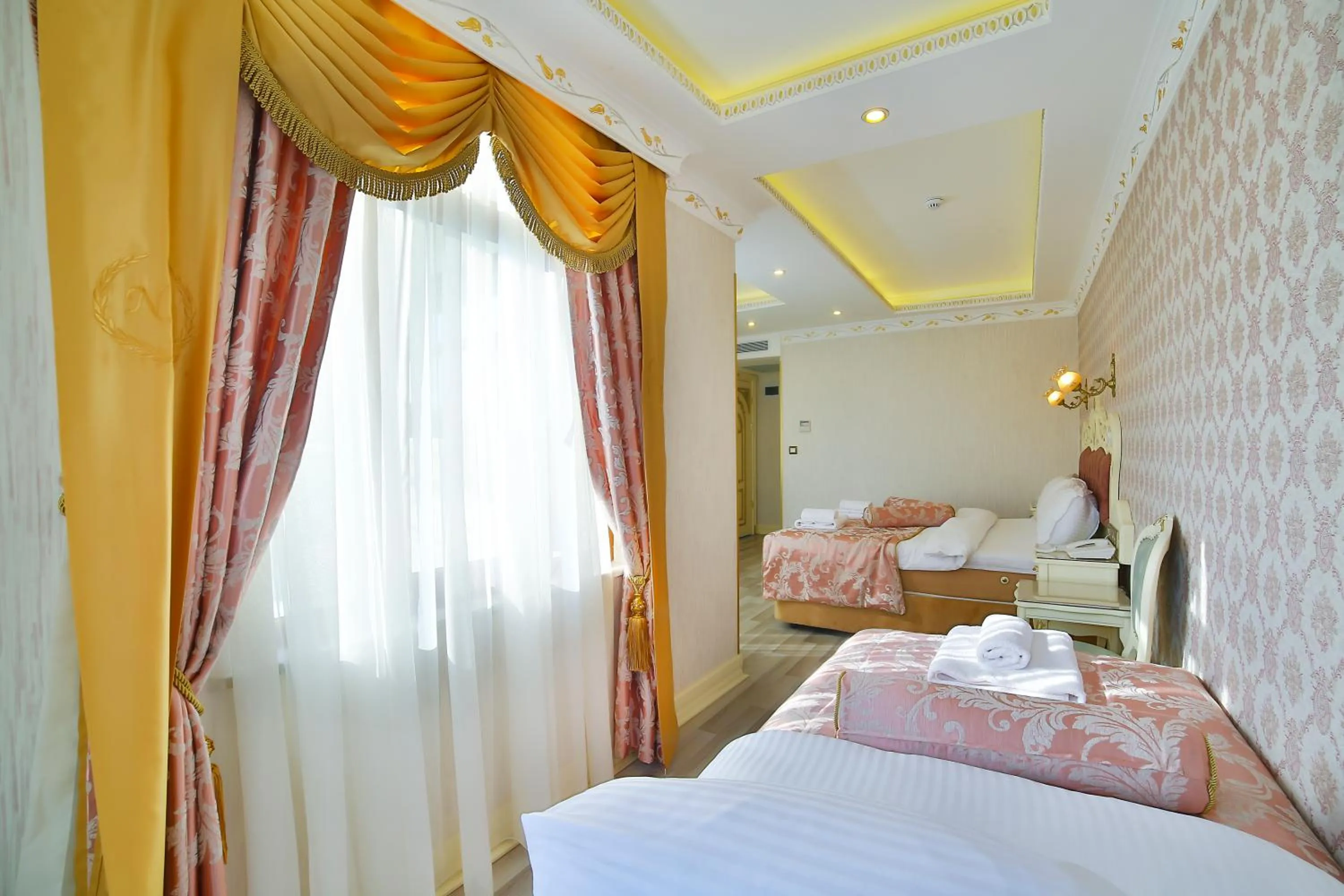 Photo of the whole room, Bed in Nayla Palace Hotel-Special Category