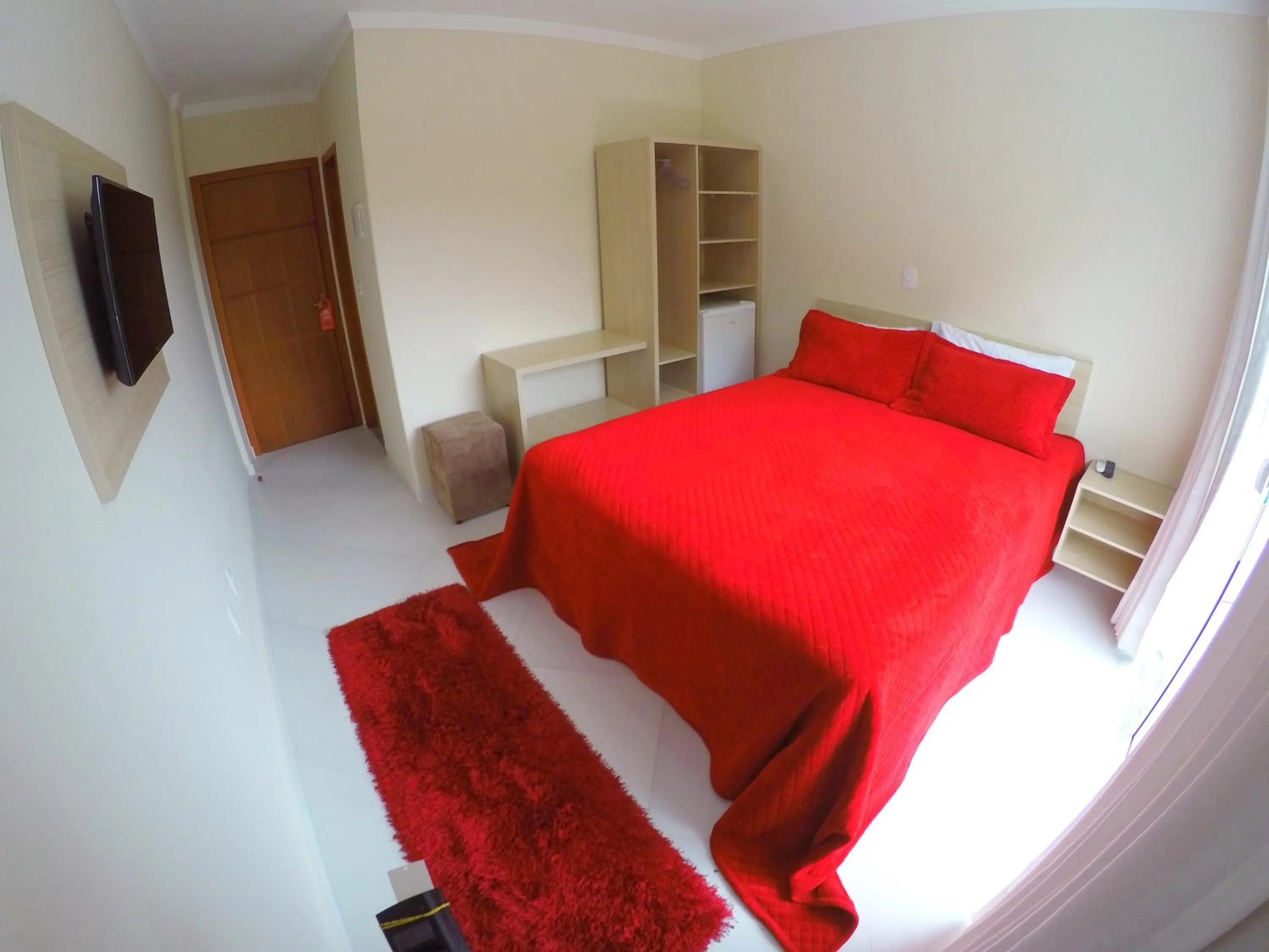 Bed in Pousada Magnus