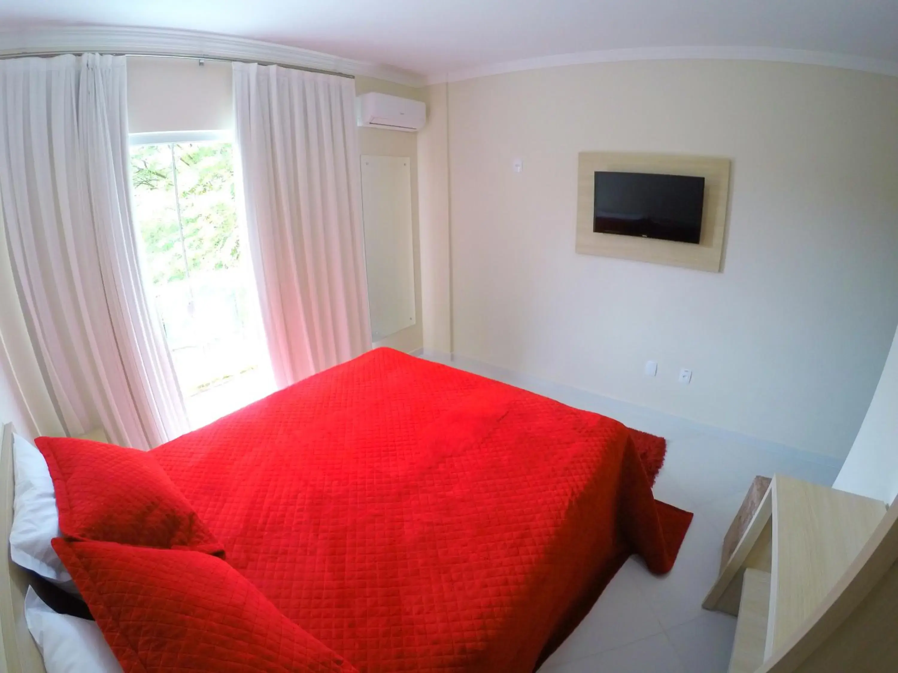 Double Room with Balcony and Side Sea View in Pousada Magnus Double Room with Balcony and Side Sea View in Pousada Magnus