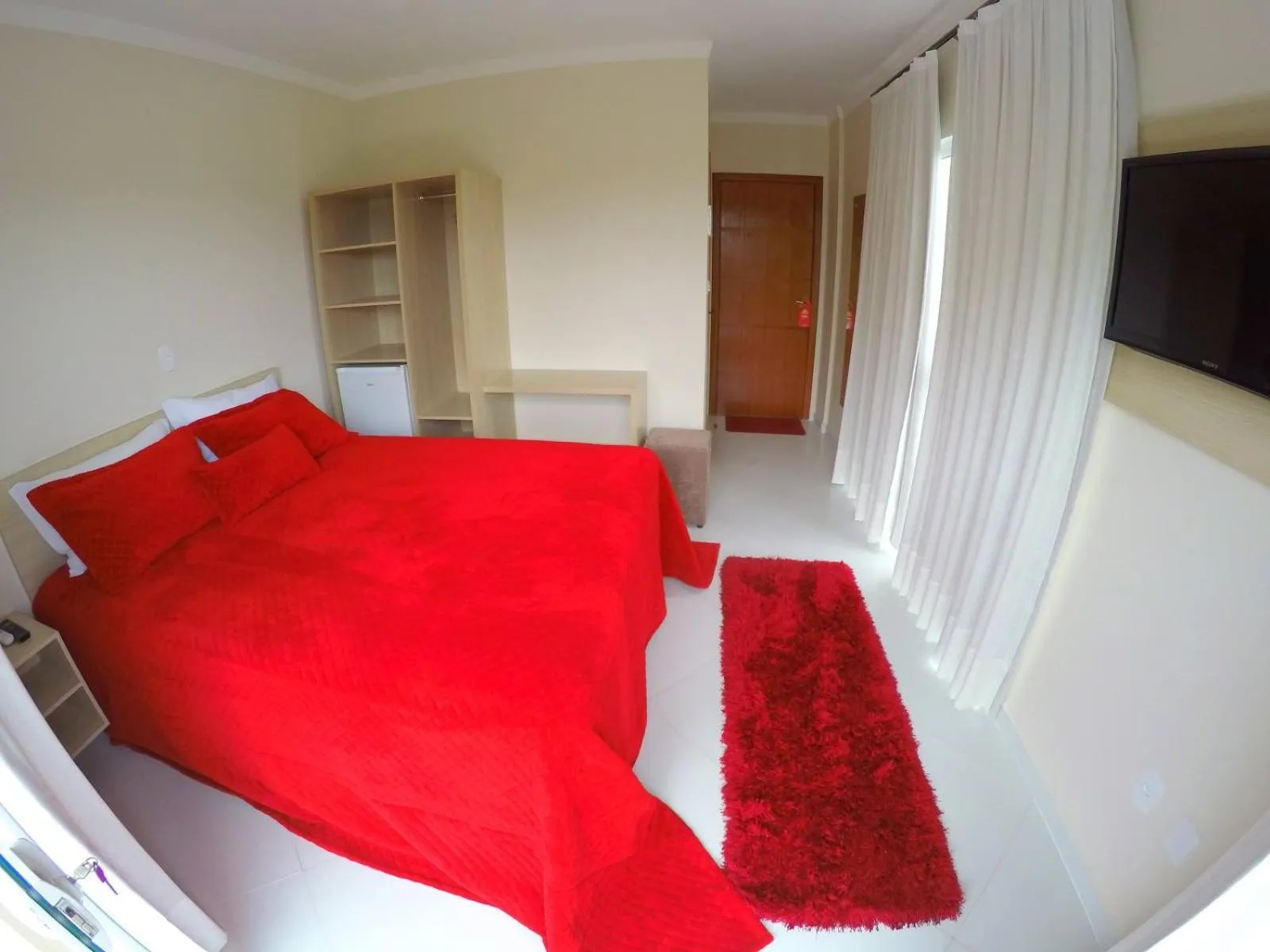 Bed in Pousada Magnus