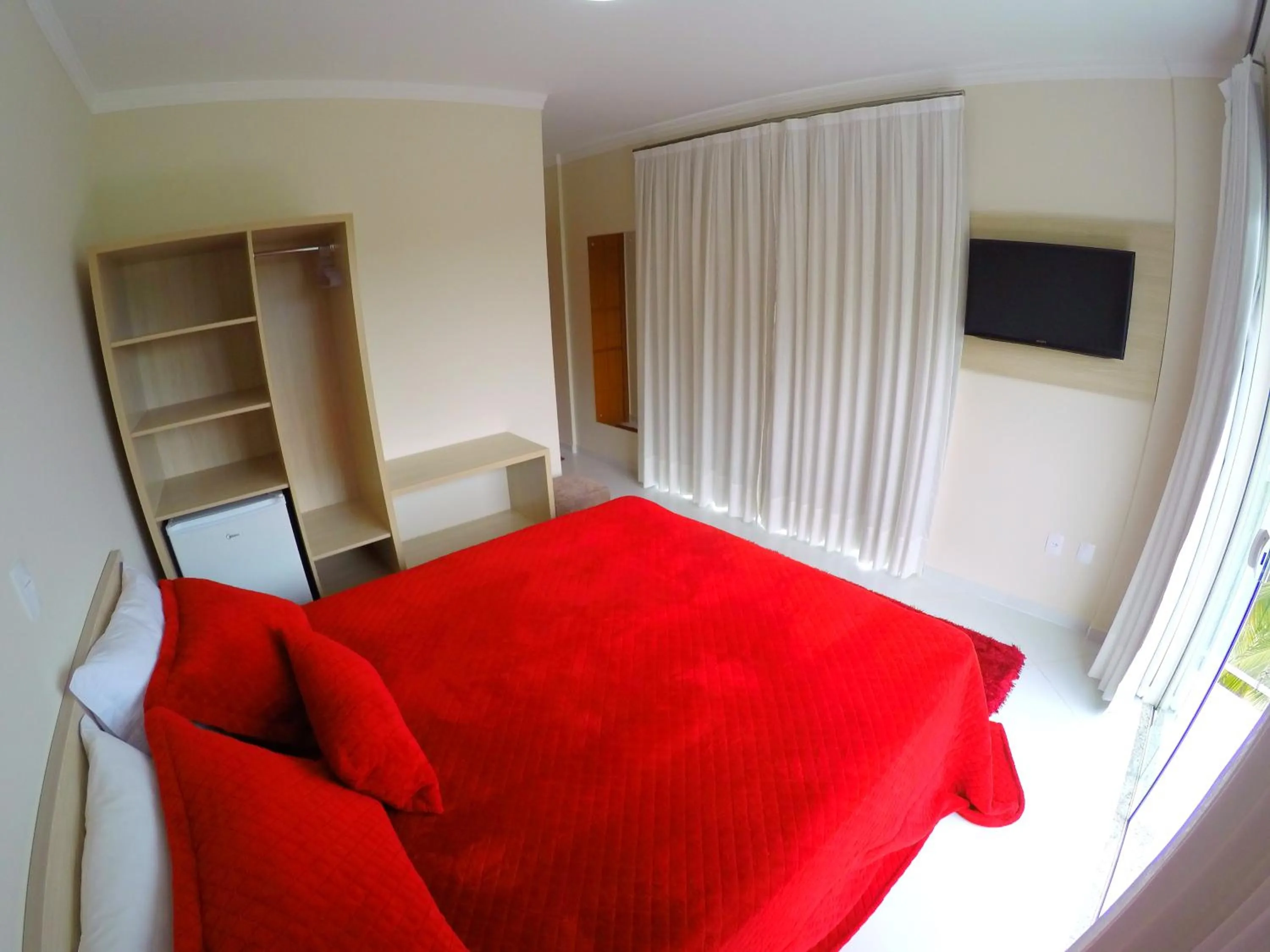 Bed in Pousada Magnus