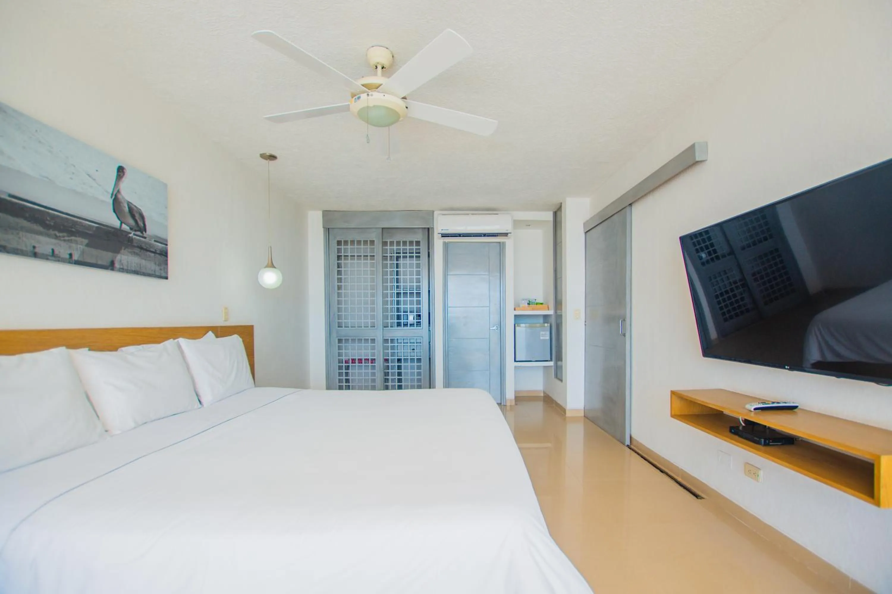 Photo of the whole room, Bed in Tamaca Beach Resort