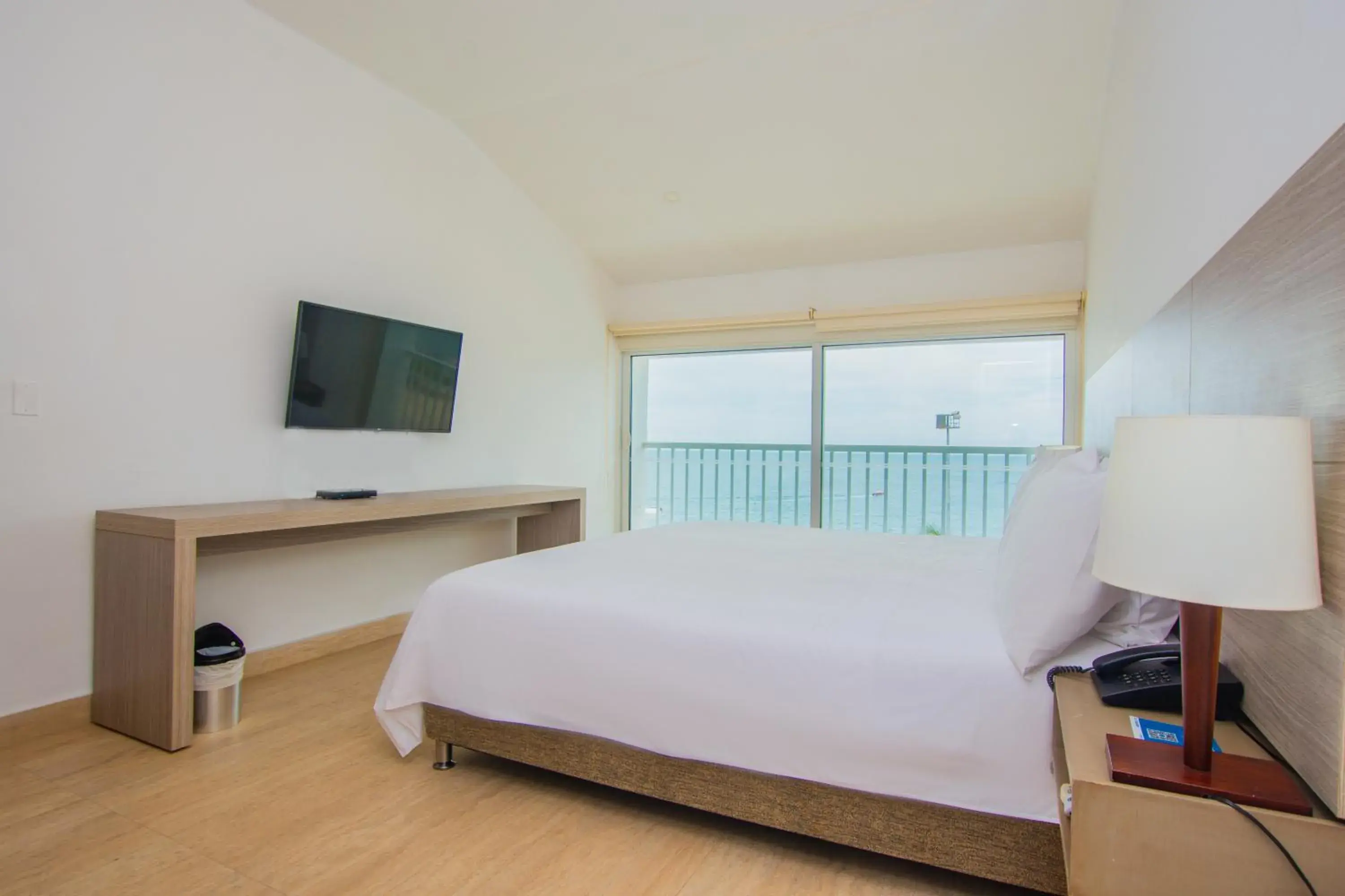 Photo of the whole room, Bed in Tamaca Beach Resort Photo of the whole room, Bed in Tamaca Beach Resort