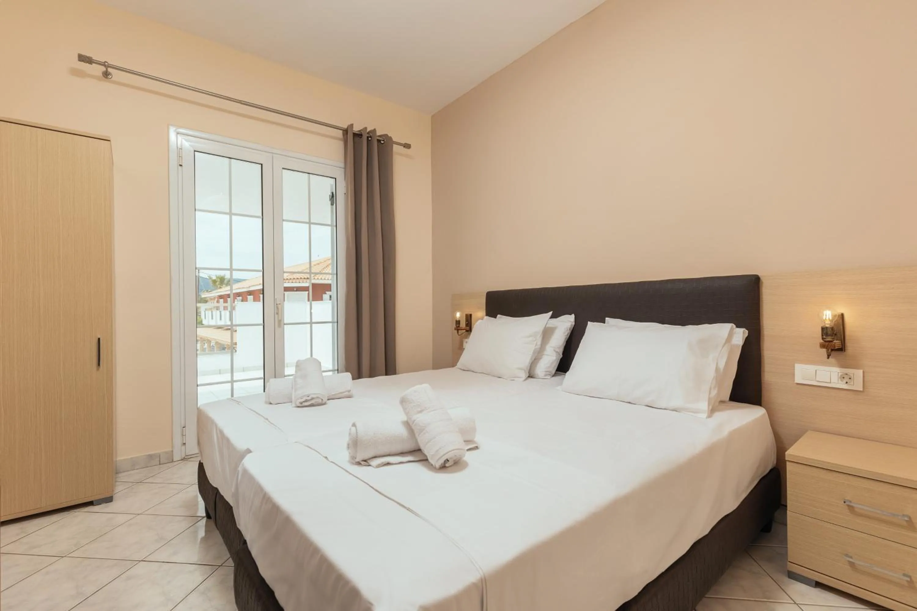 Bed in Yakinthos Hotel