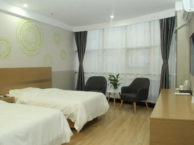 Bed in GreenTree Inn Lvliang Xiaoyi City Fuqian Street Hotel