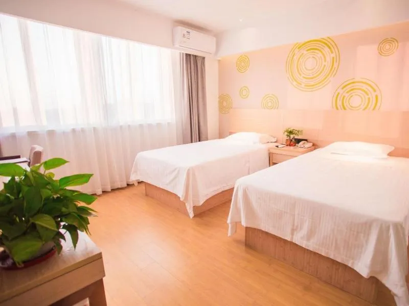 Bed in GreenTree Inn Yangzhou Jiangdu Xiaoji Town South Zhongxing Road Express Hotel