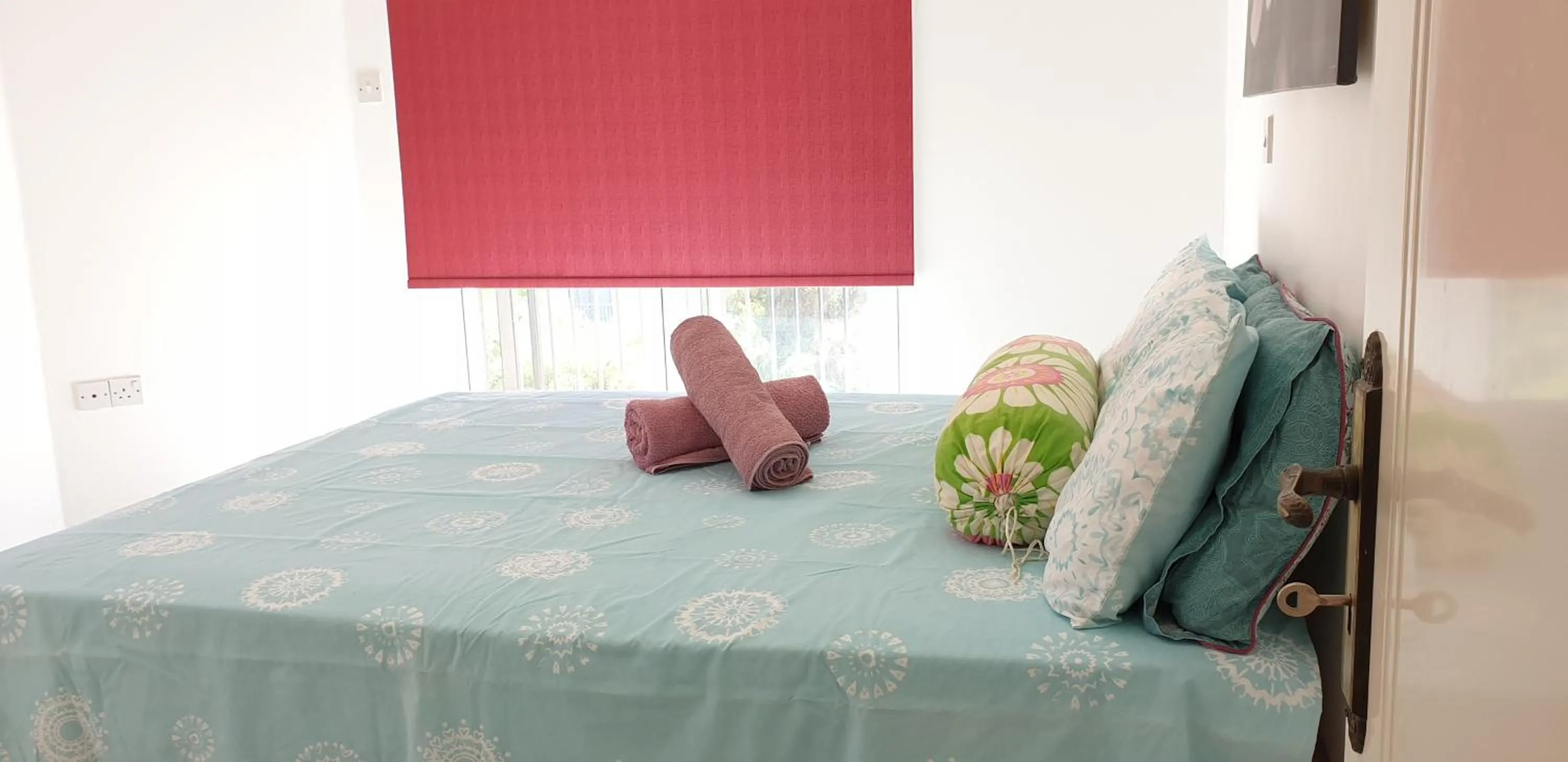 Bed in Athena and The Owl Beachside Apt