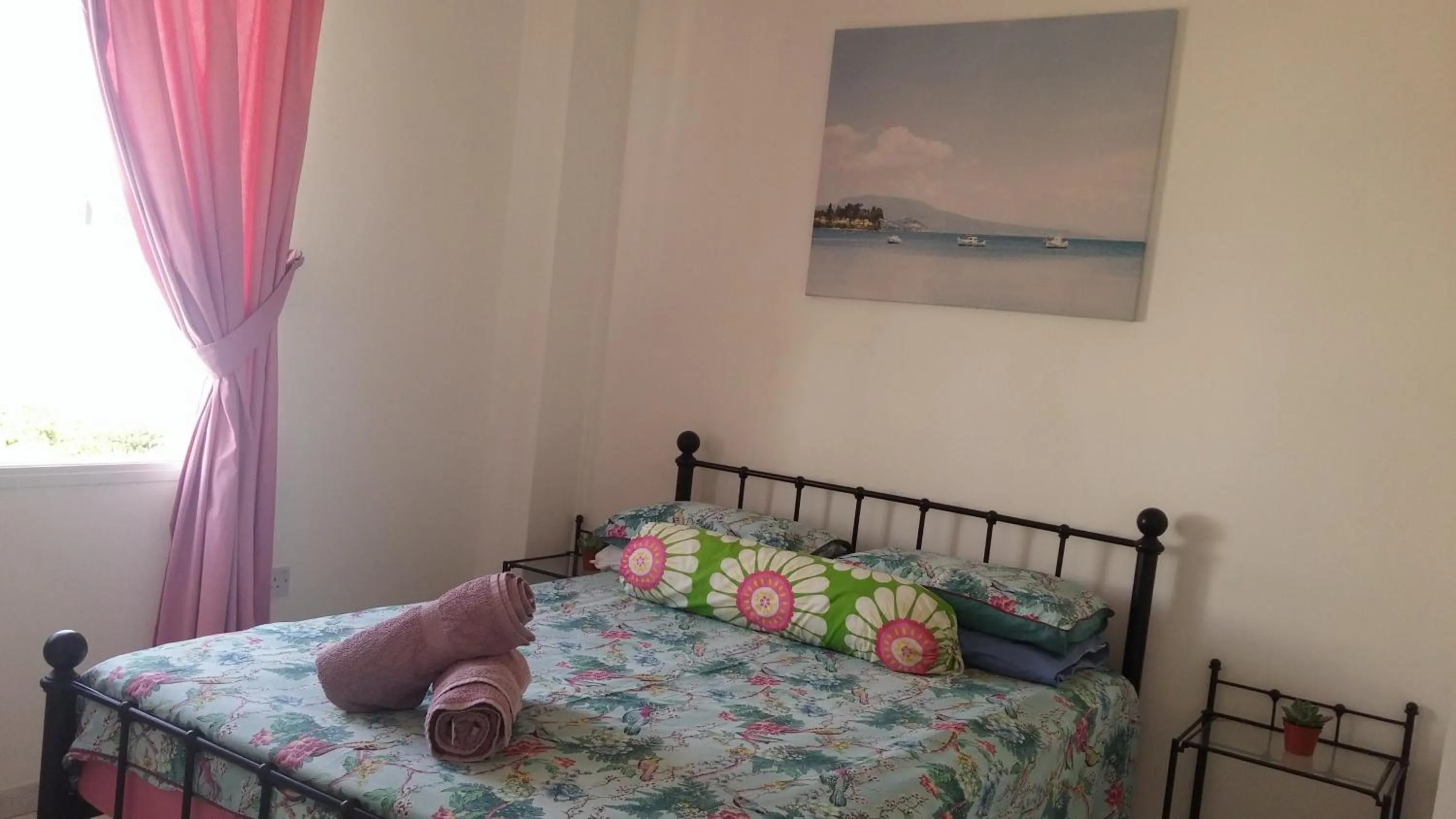 Bed in Athena and The Owl Beachside Apt