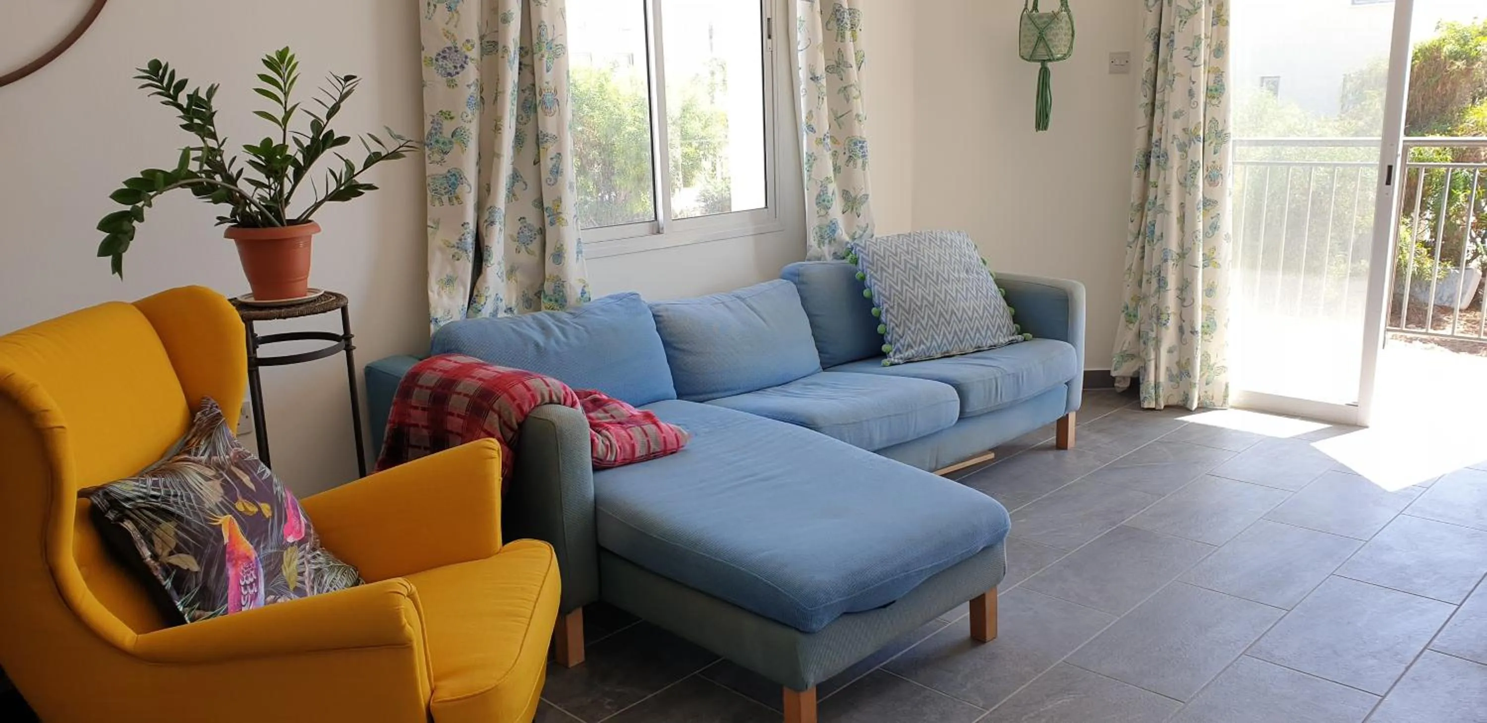 Living room in Athena and The Owl Beachside Apt