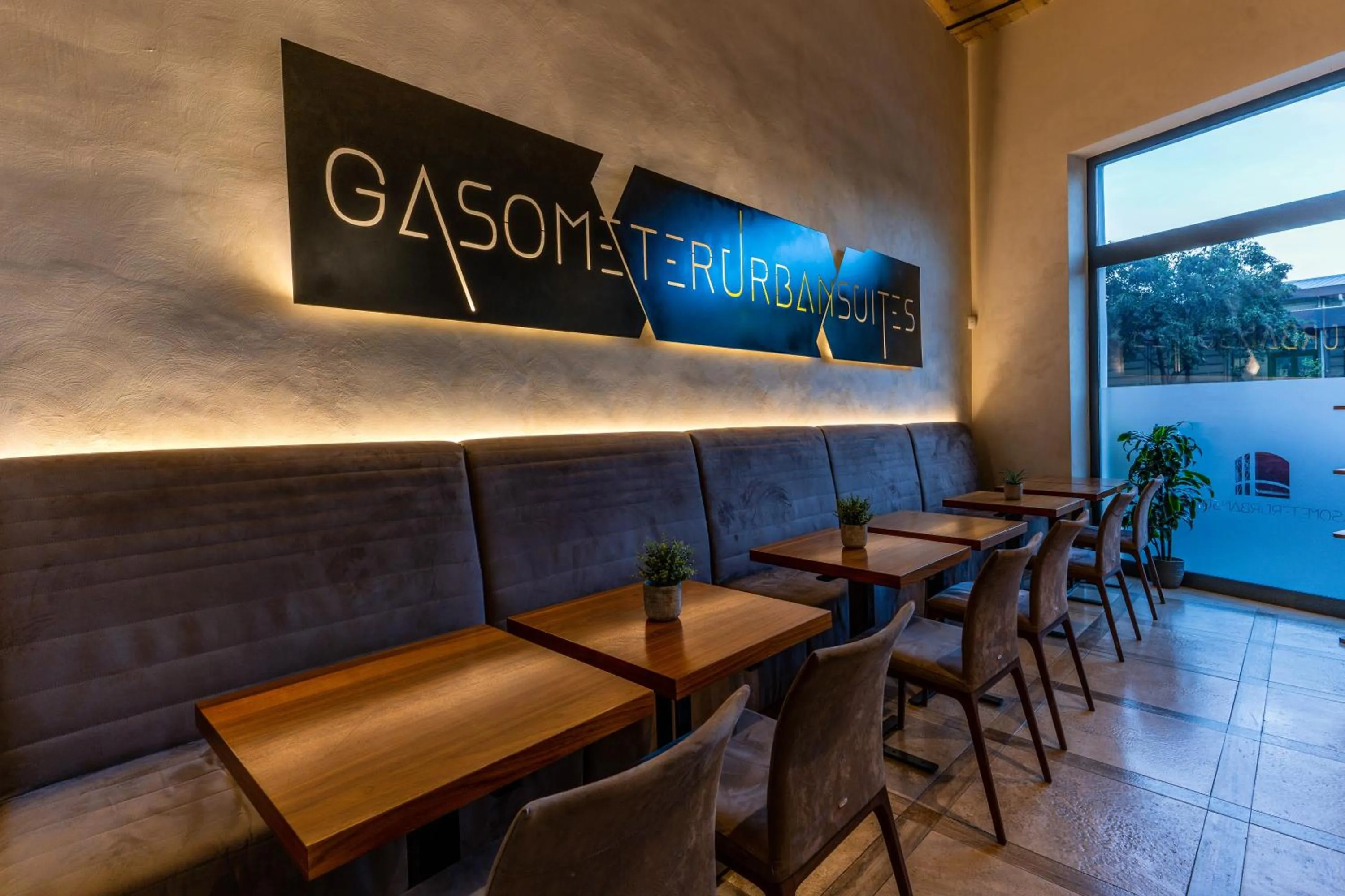 Property logo or sign in Gasometer Urban Suites