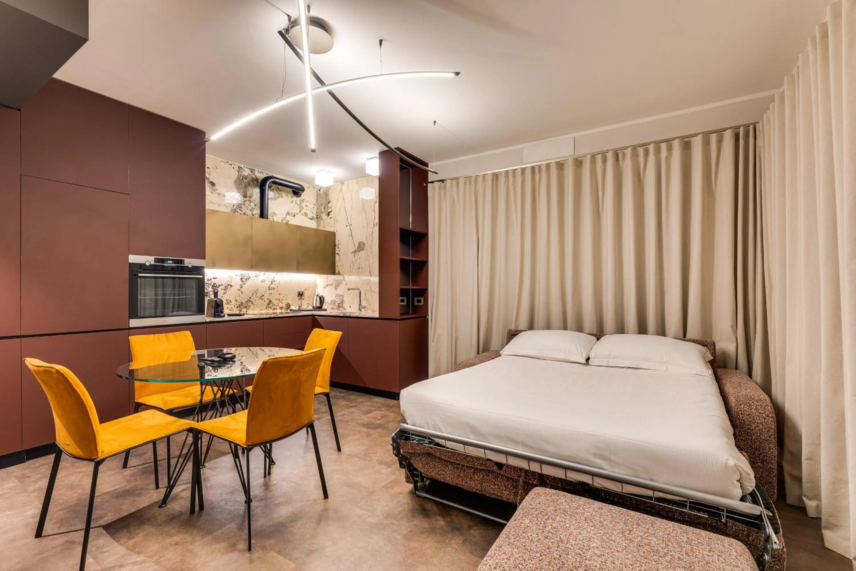 Living room, Bed in Gasometer Urban Suites