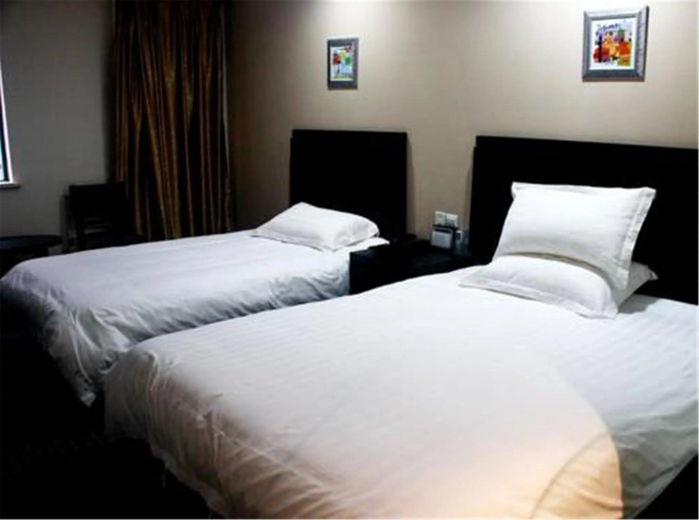 Bed in Hundred Centuries Hotel