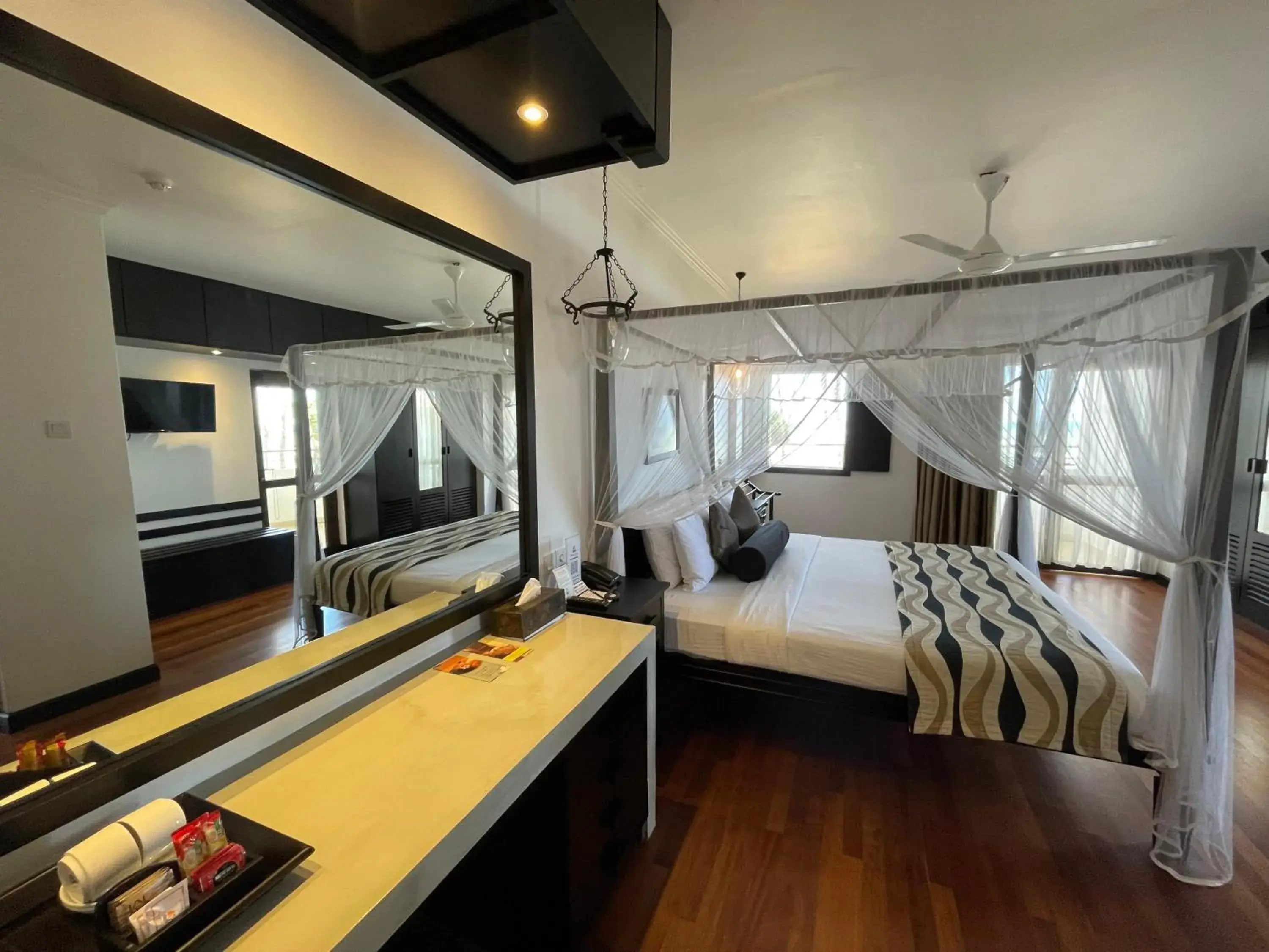 Bed in Tangerine Beach Hotel Bed in Tangerine Beach Hotel