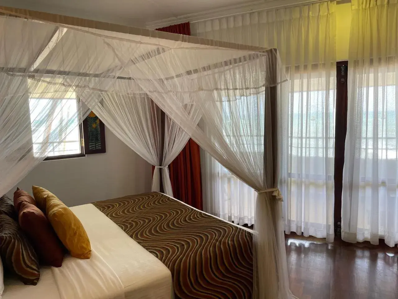 Bed in Tangerine Beach Hotel Bed in Tangerine Beach Hotel