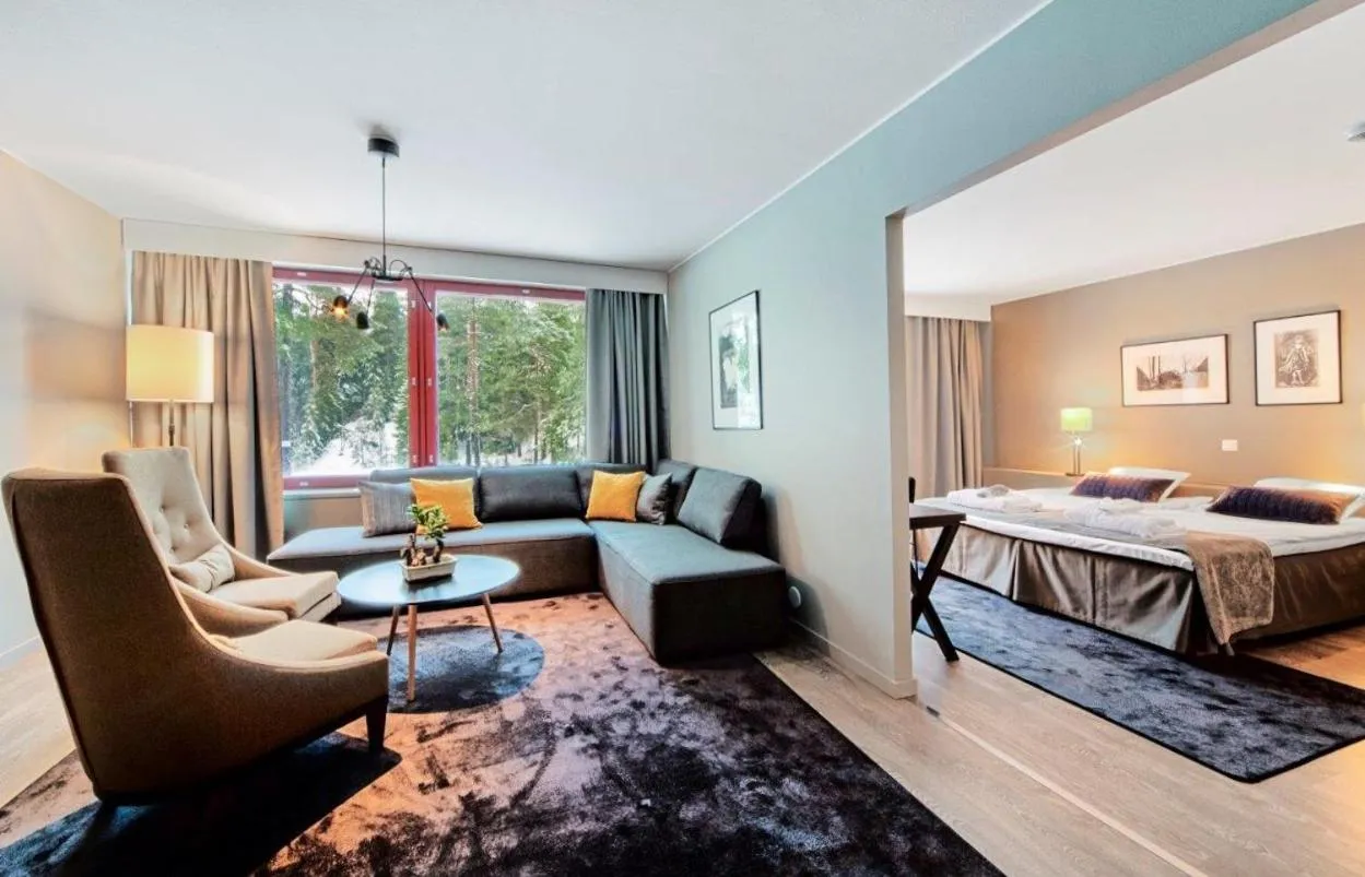 Living room, Bed in Hotel Korpilampi