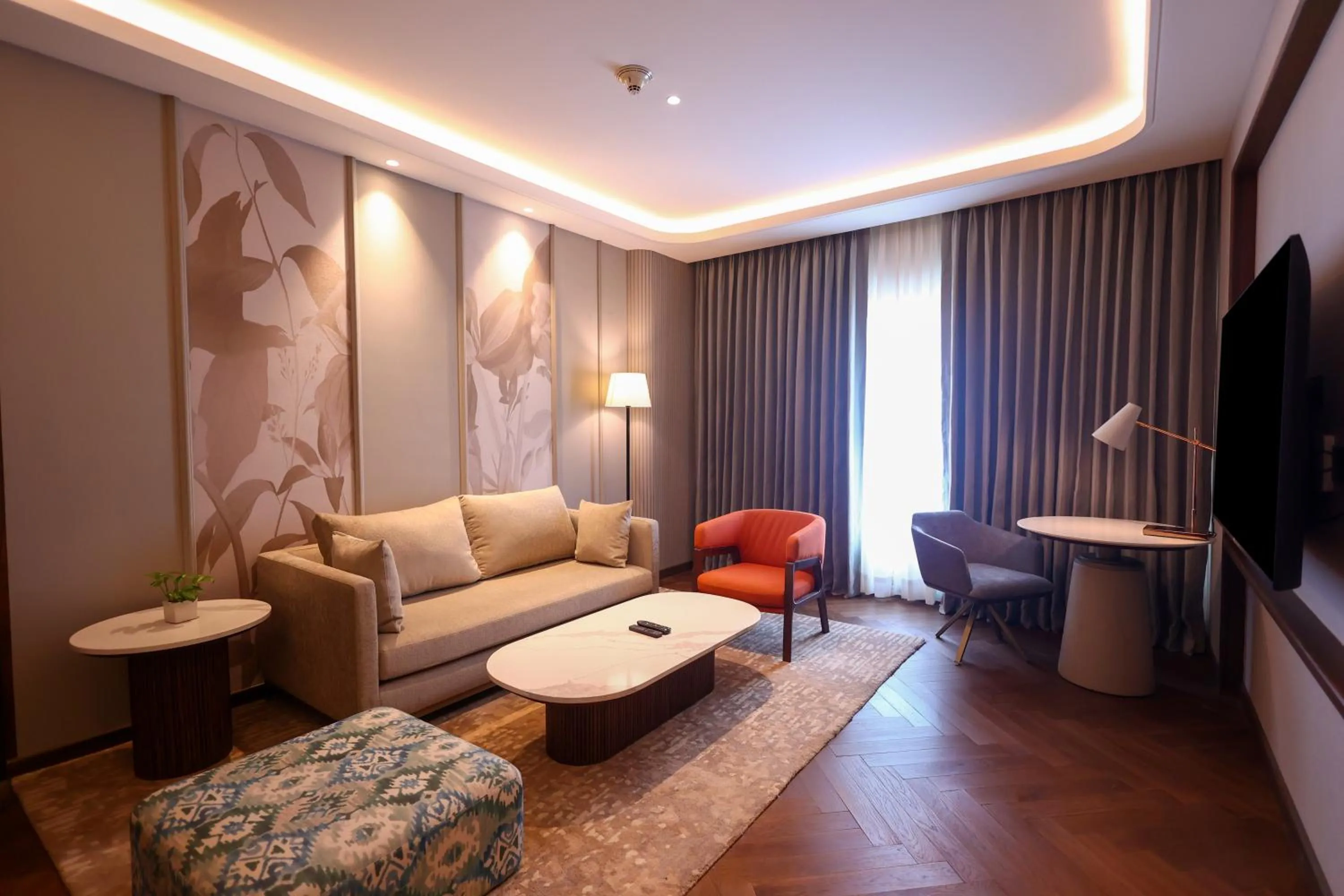 Living room in Holiday Inn New Delhi Mayur Vihar Noida by IHG