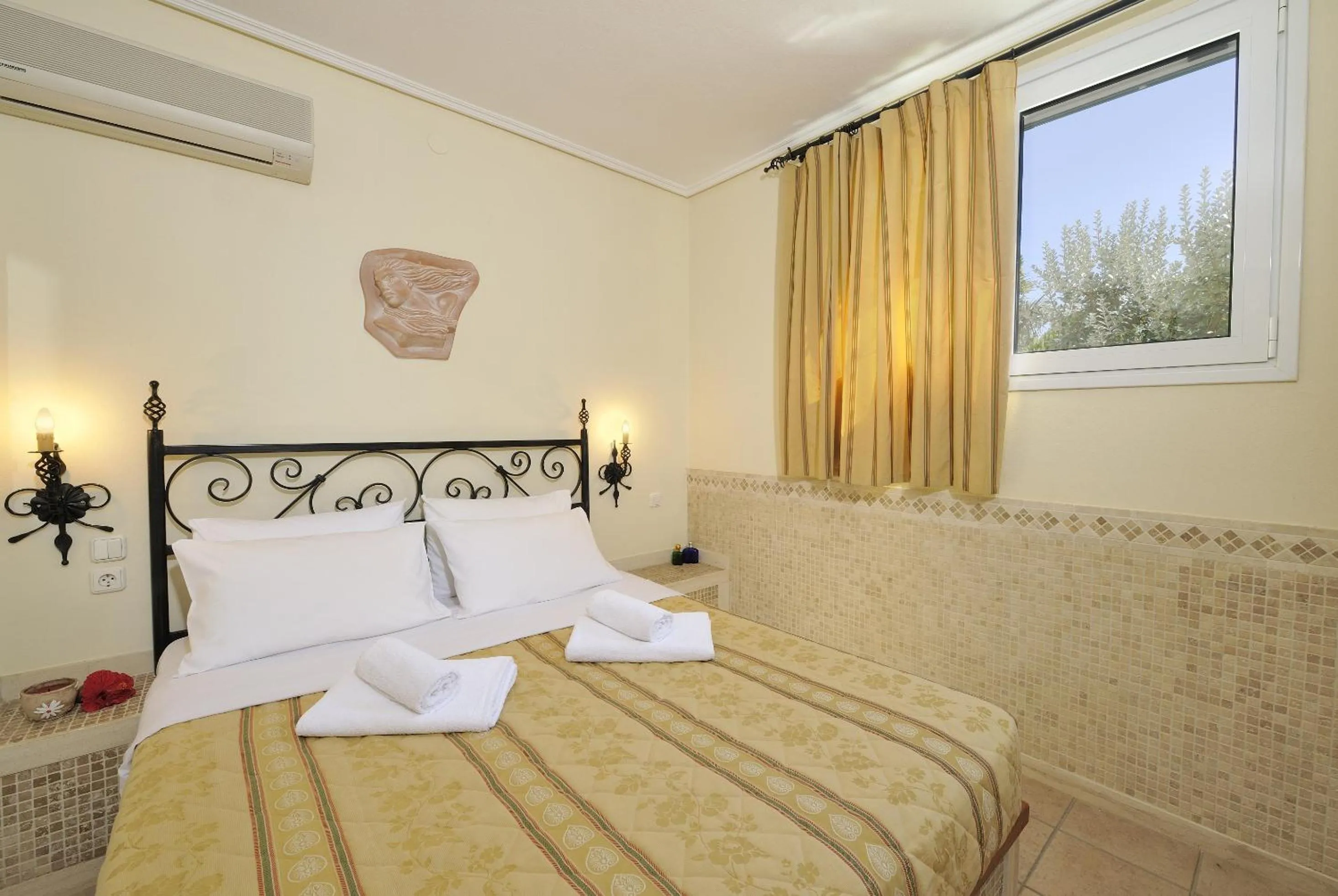 Bed in Paris Village Apartments