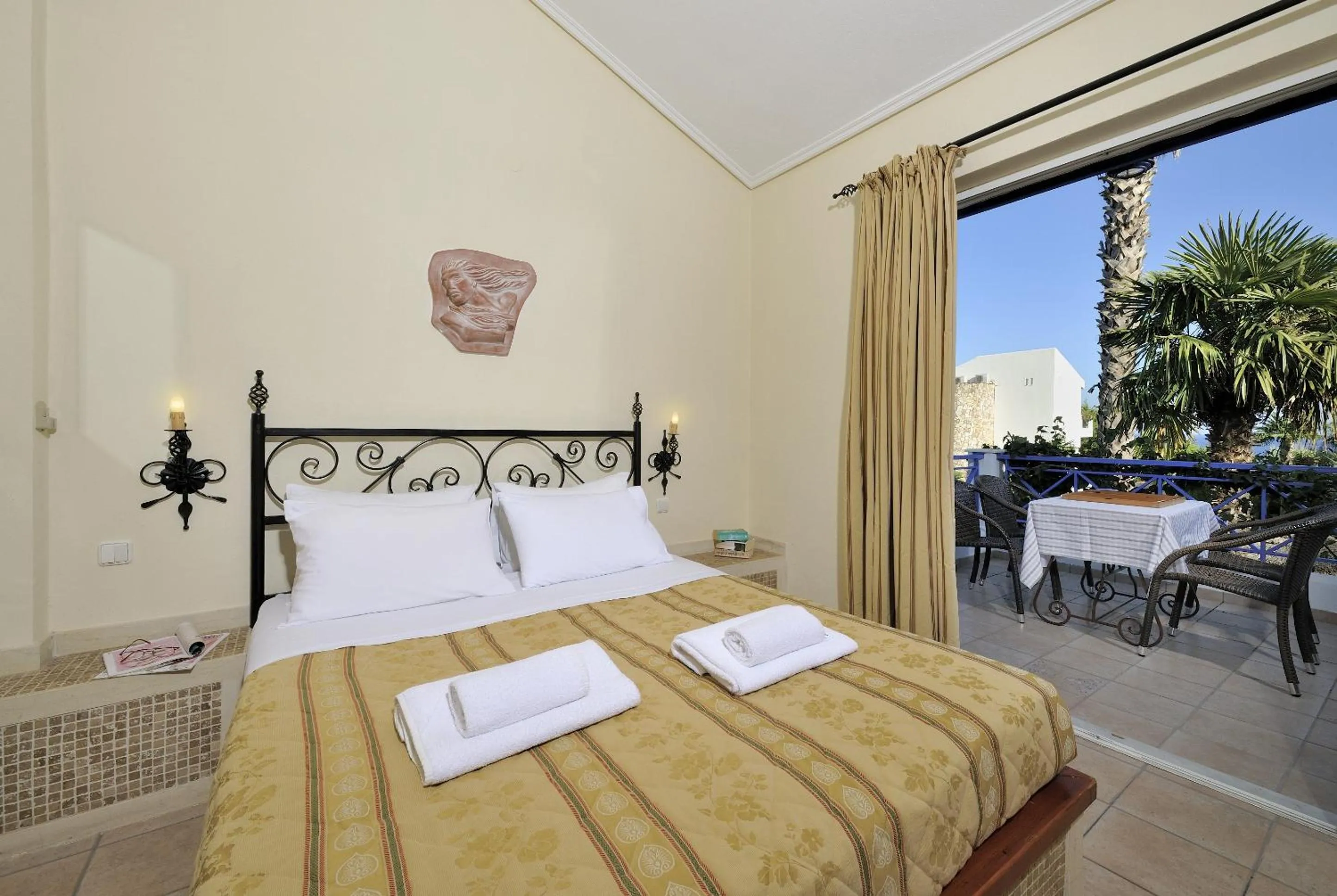 Bed in Paris Village Apartments