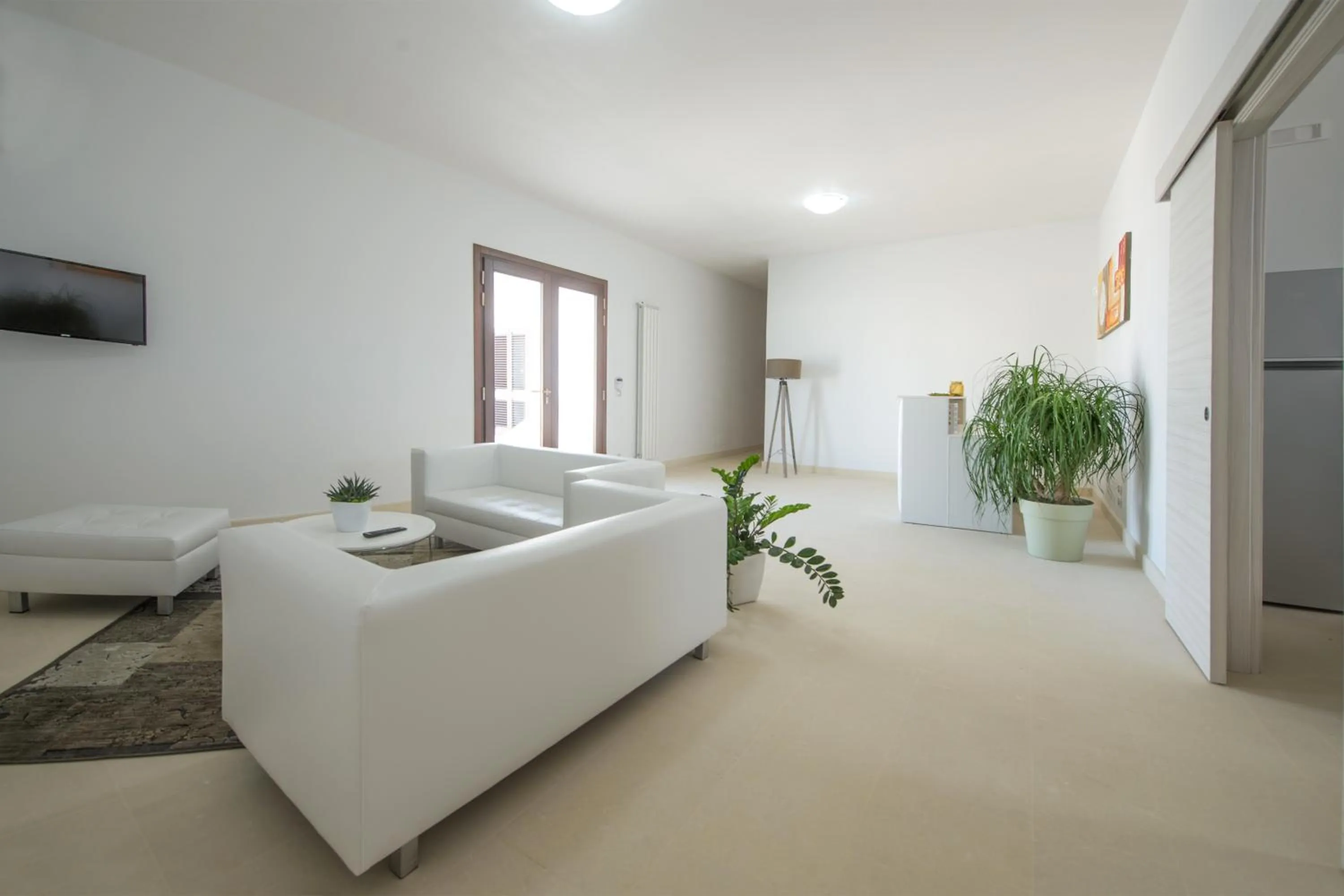 Communal lounge/ TV room in Villa Lupia