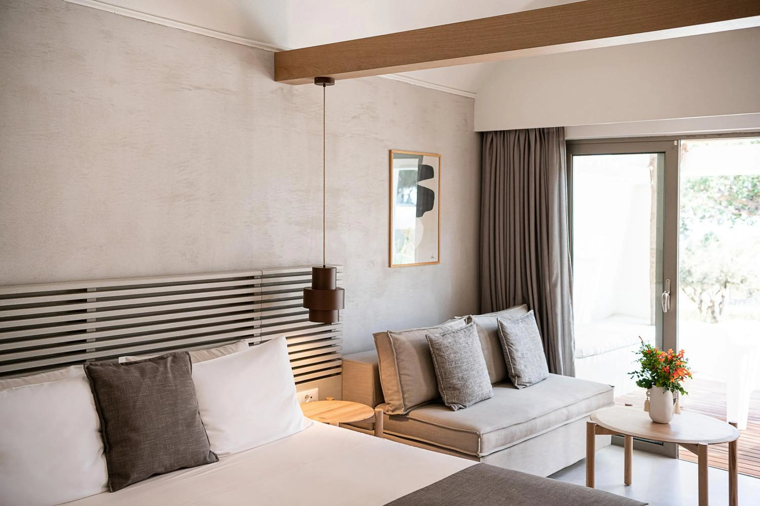 Seating area, Bed in Kakkos Bay Hotel and Bungalows