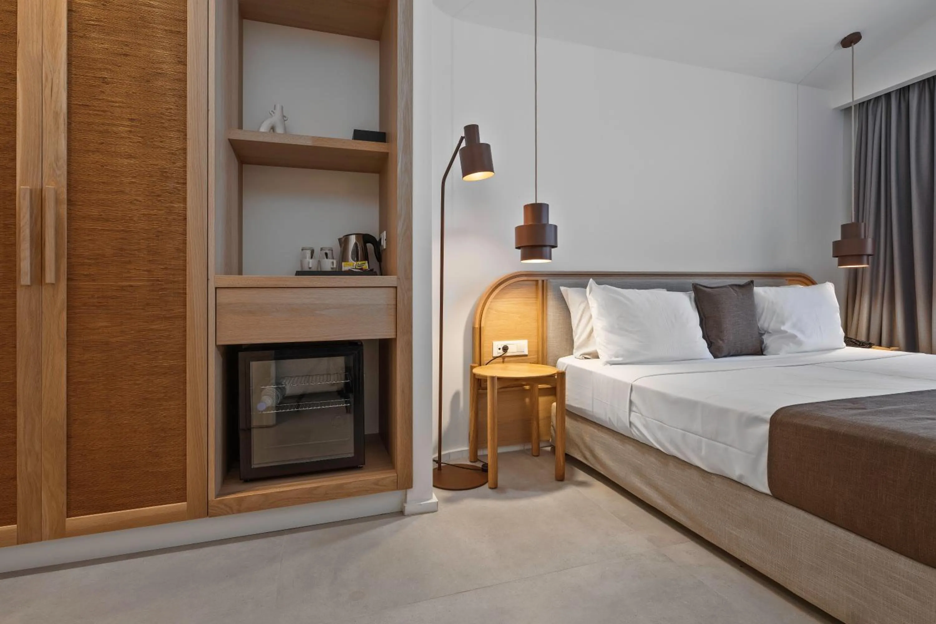 Bed in Kakkos Bay Hotel and Bungalows