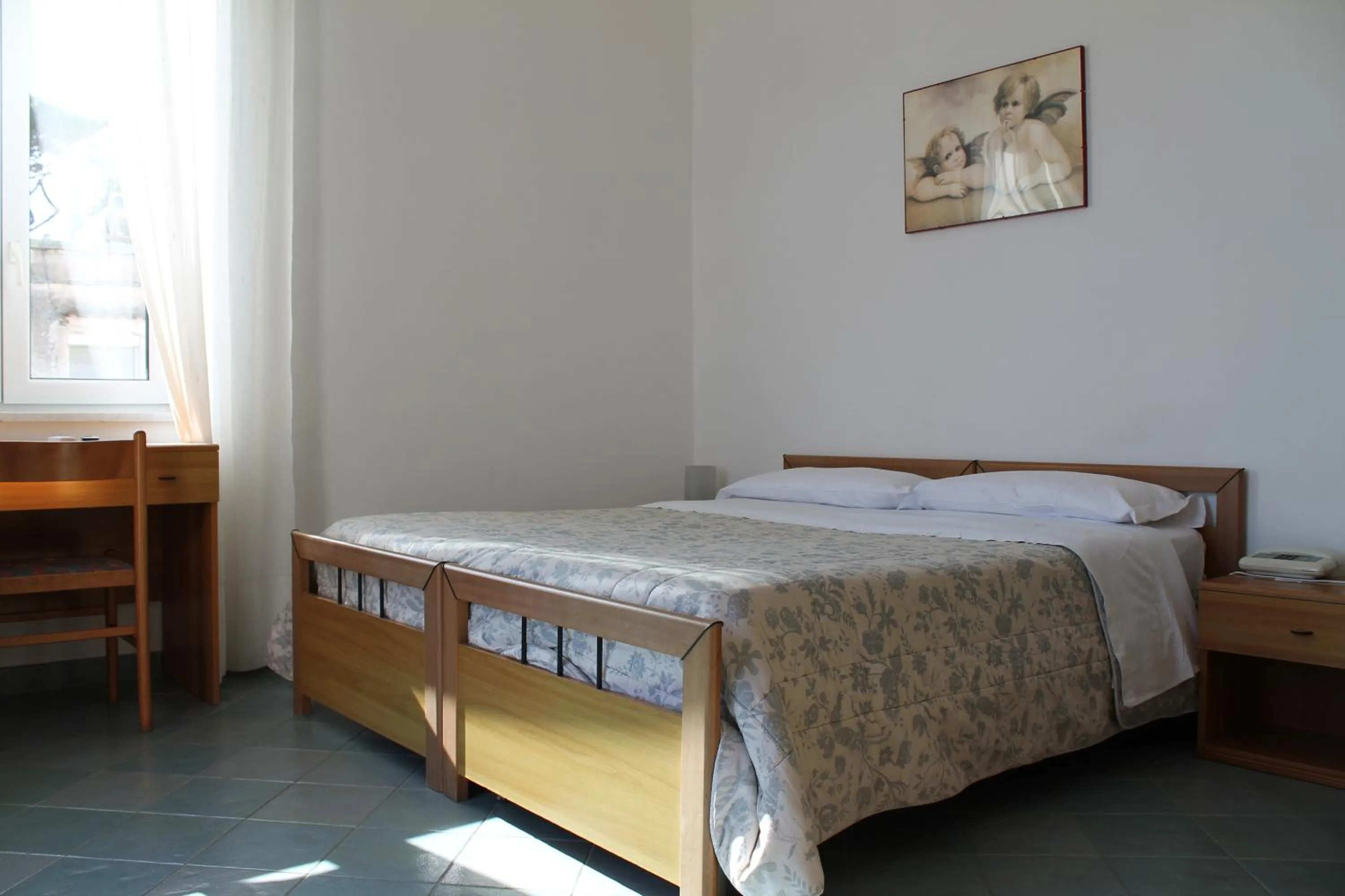 Bed in Hotel Esperia