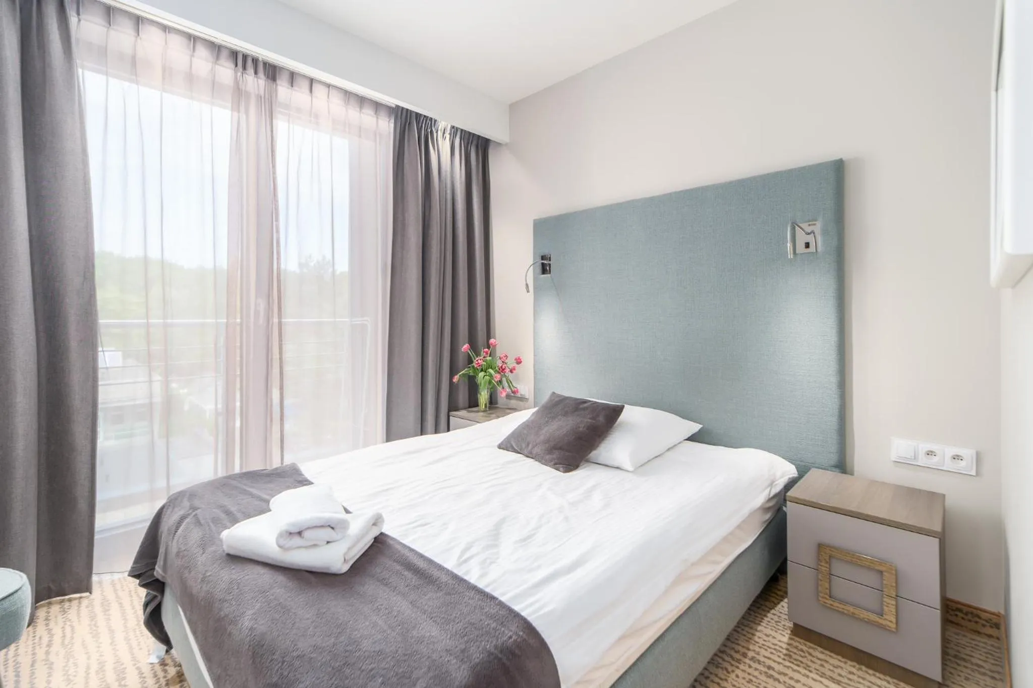 Bed in SeaPark Hotel Wellness & Spa