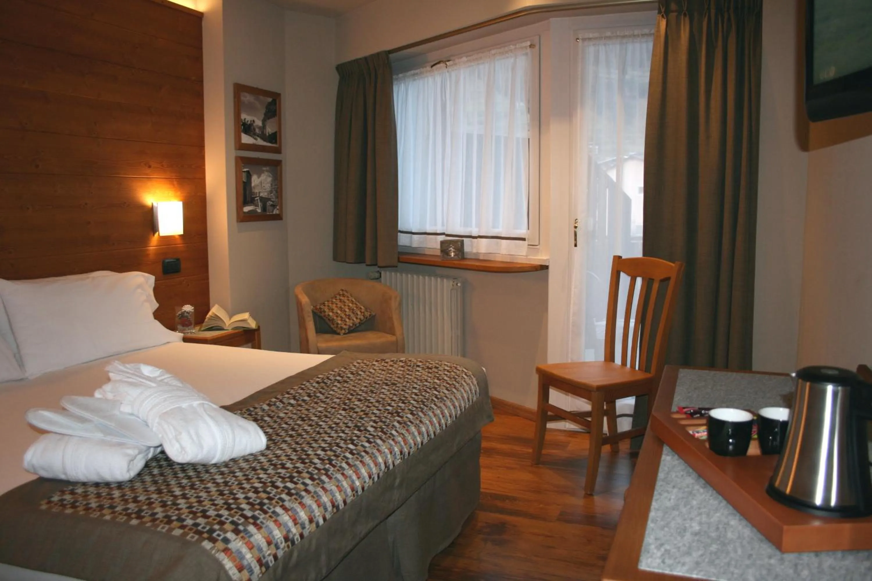 Bed in Hotel Larice Bianco