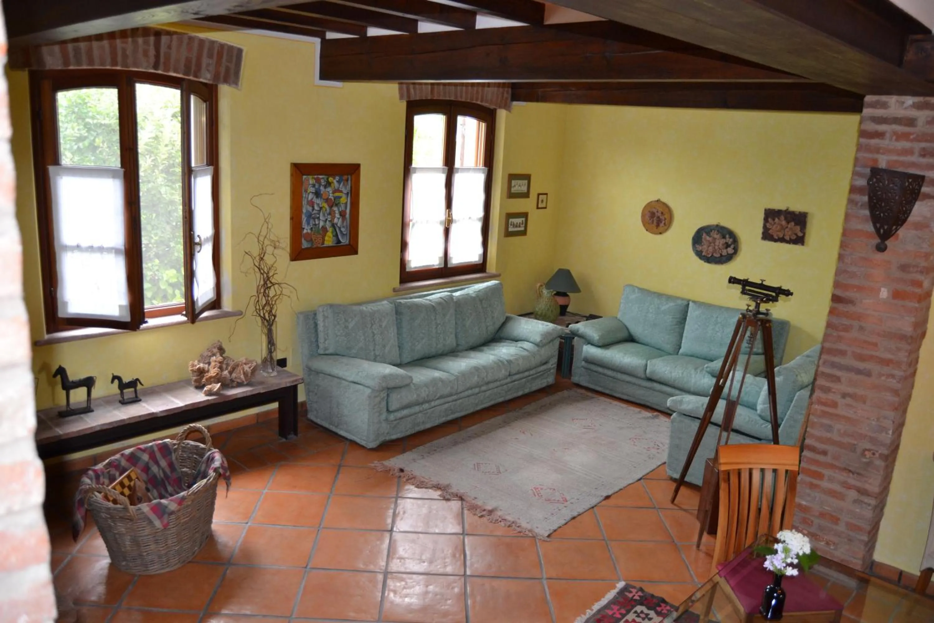 Communal lounge/ TV room in B&B Il Martin Pescatore