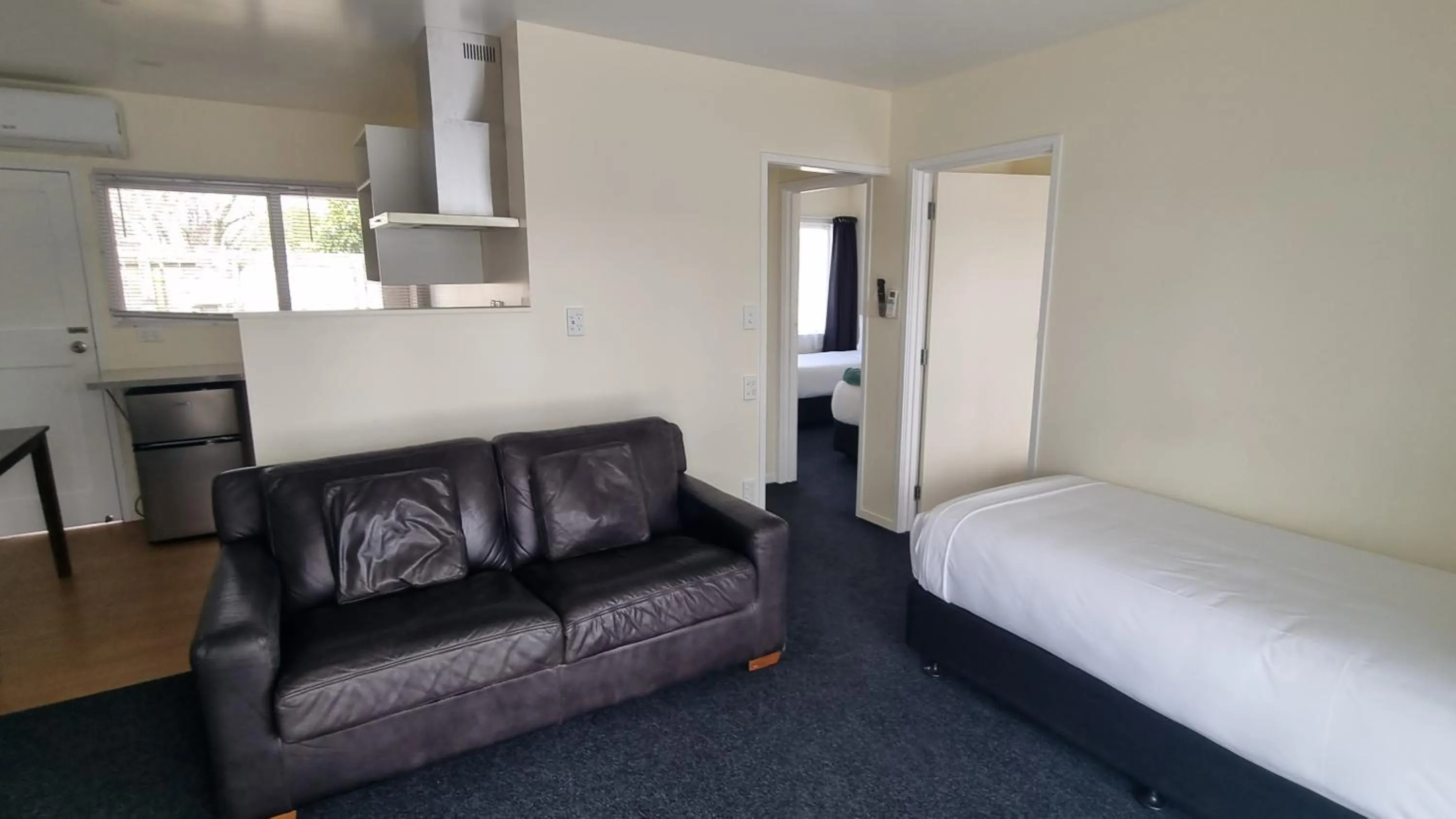 Kitchen or kitchenette, Bed in Twin Coast Adventures