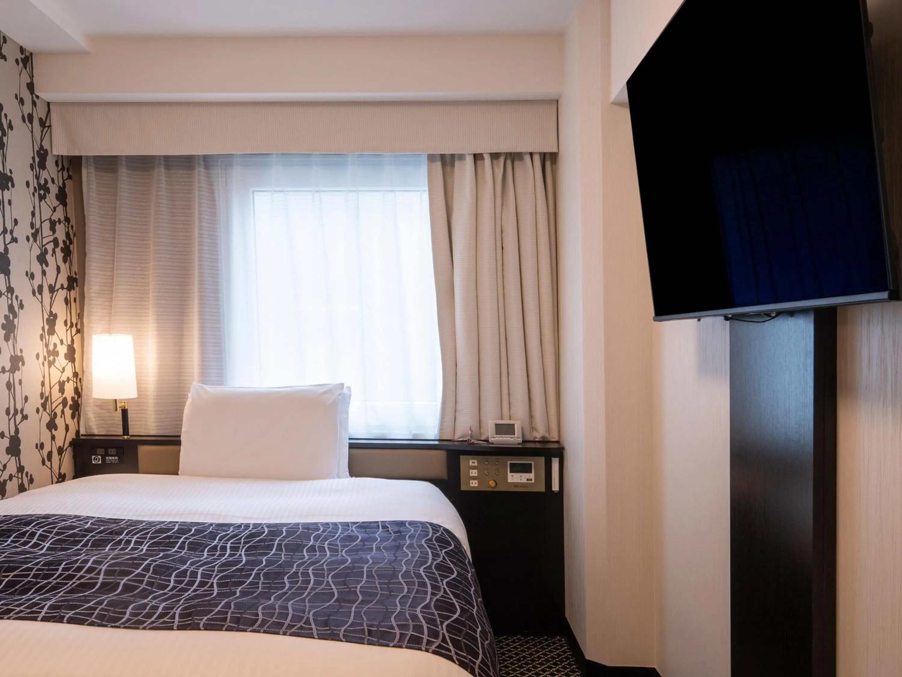 Photo of the whole room, Bed in APA Hotel Hatchobori Shintomicho